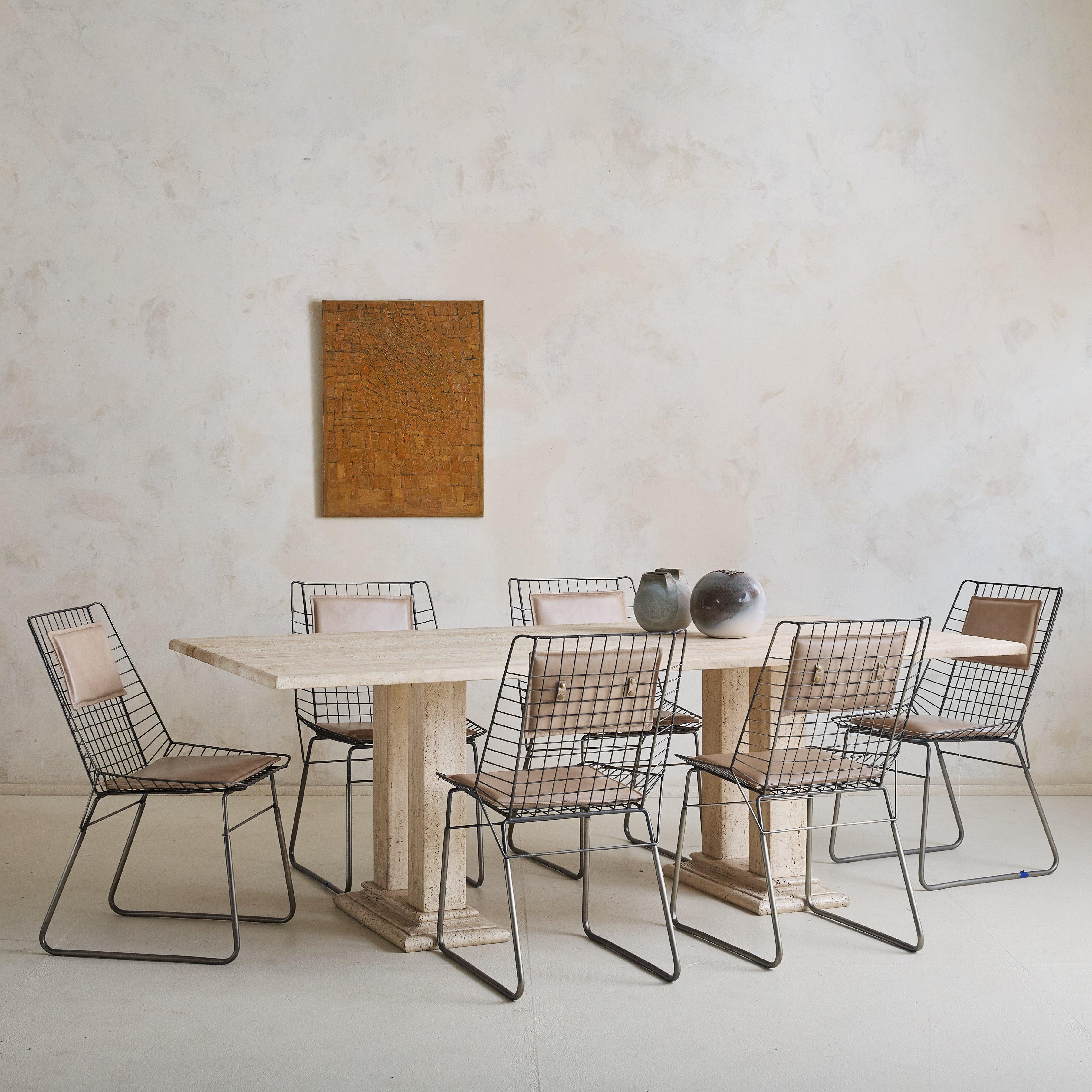 The ‘Flamingo’ dining chair, designed by Cees Braakman for Pastoe in the 1960s, is a nod to mid-century Dutch minimalism. The design features a chrome-plated wire-mesh frame with curved steel rods, creating an airy yet strong silhouette. This set of