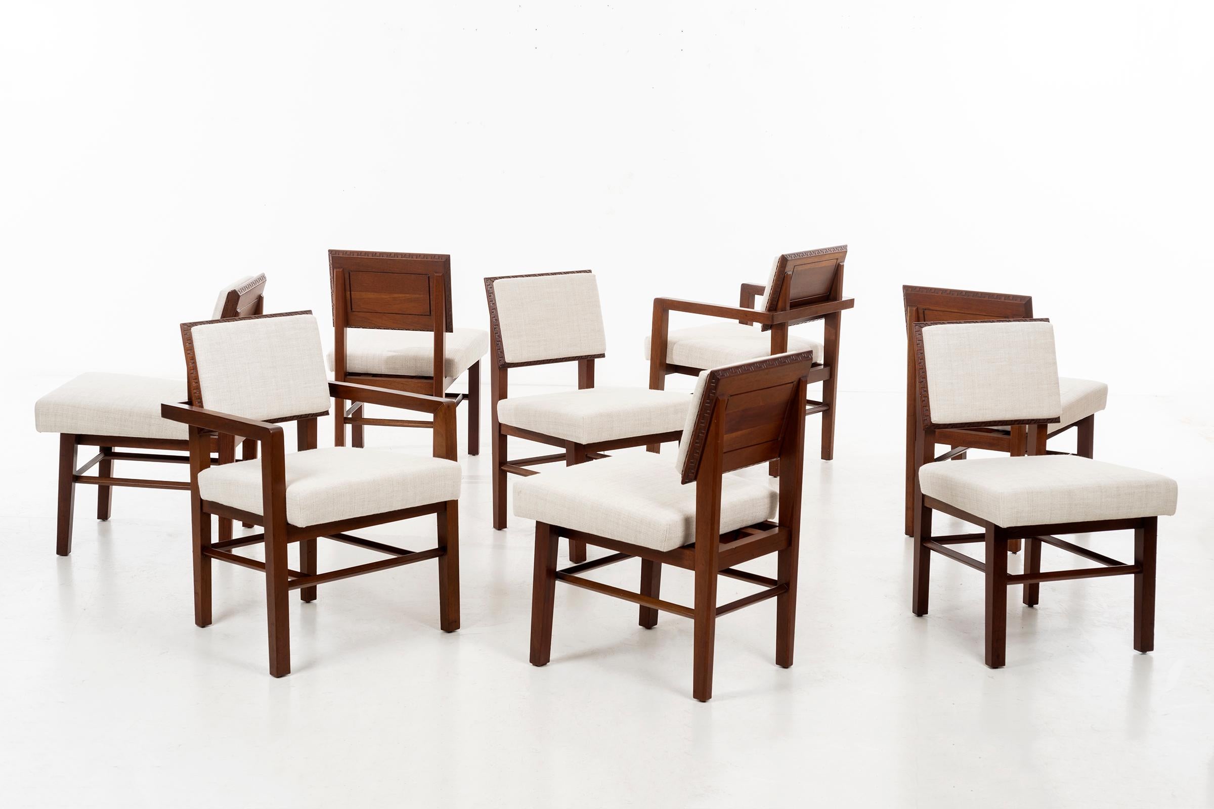 Eight Taliesin pattern dining chairs: 2 armchairs with 6 side chairs, solid mahogany wood with recent conservation restored oil finish.
Reupholstered with great plains cotton-poly fabric. 
  

   