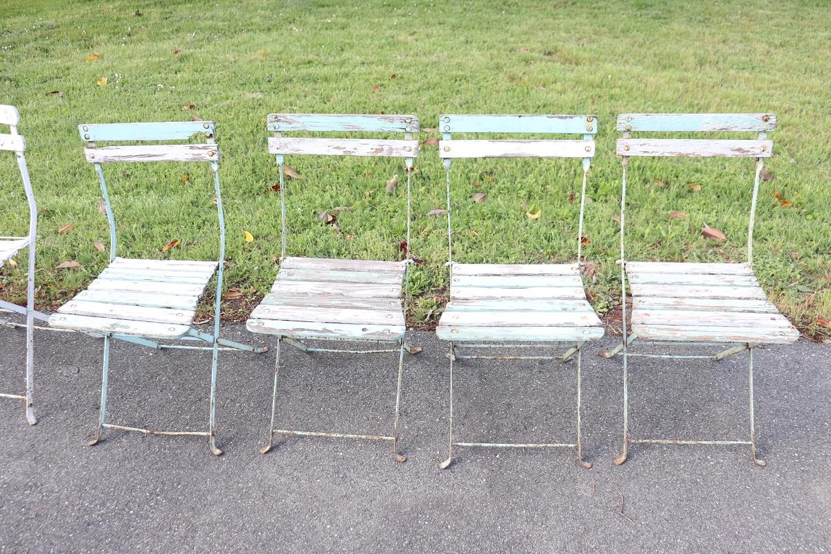 Set of 8 French Bistro Garden Folding Chairs in Iron and Wood Slats In Fair Condition For Sale In Casale Monferrato, IT