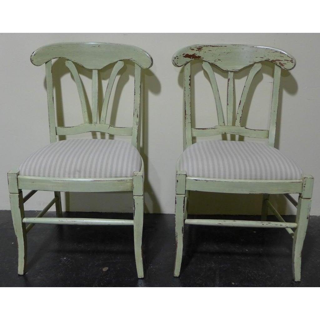 green painted dining chairs