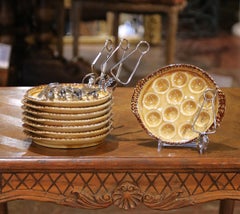 Ensemble de 8 assiettes à escargots en céramique de Gien et cuillères assorties, vers 1920