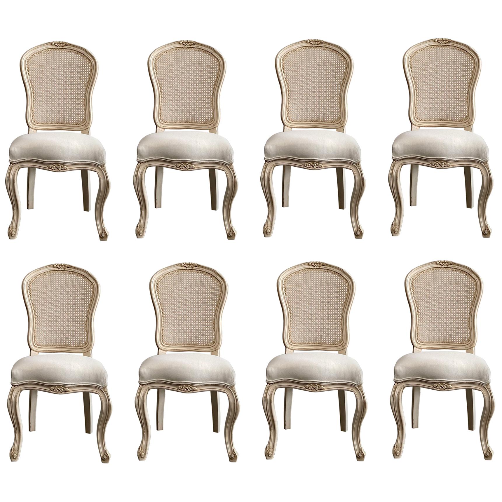 Set of 8 French Louis XV Style Painted and Upholstered Cane Back Chairs