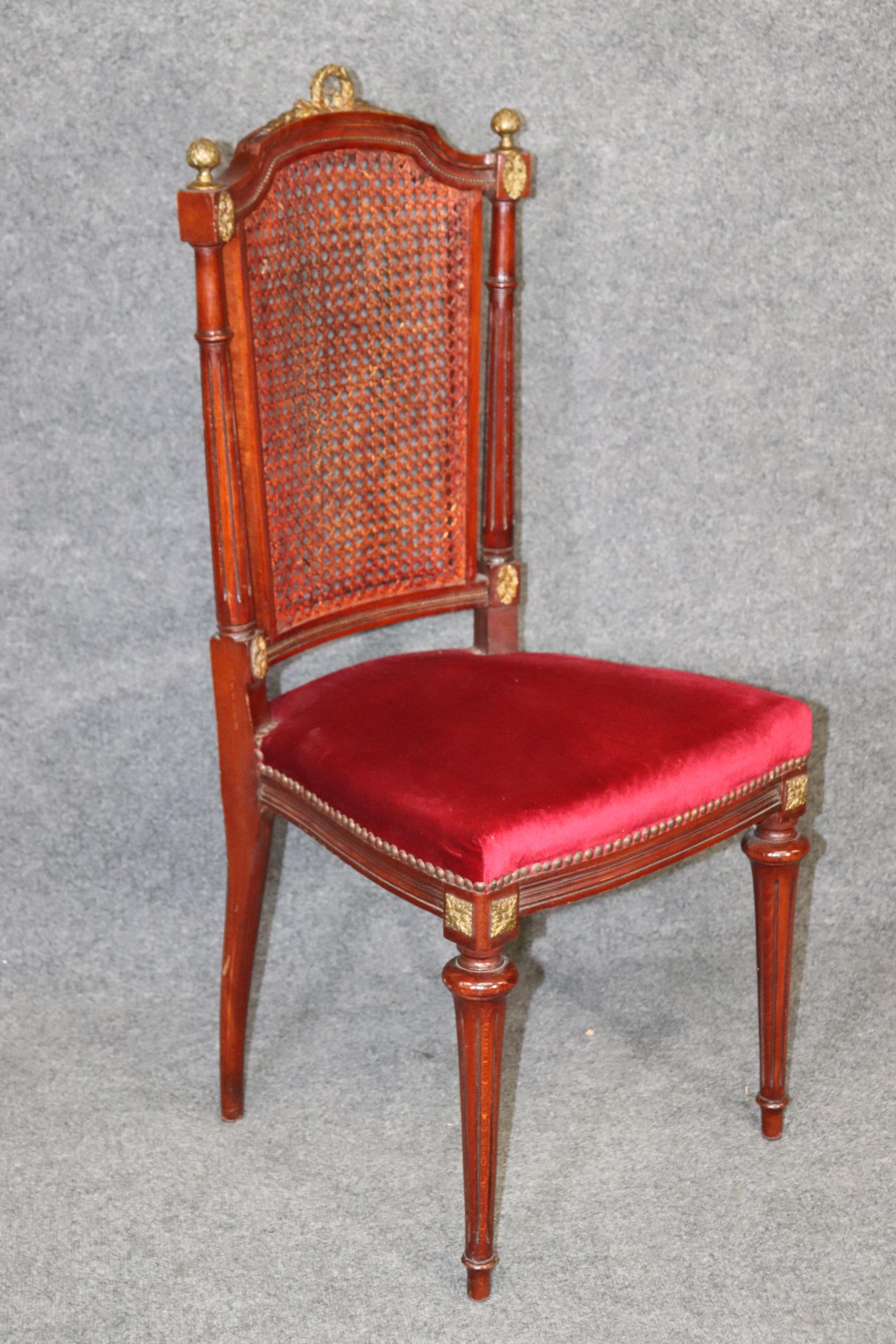 Set of 8 French Louis XVI Style Mahogany Cane Back Dining Chairs with Ormolu For Sale 1