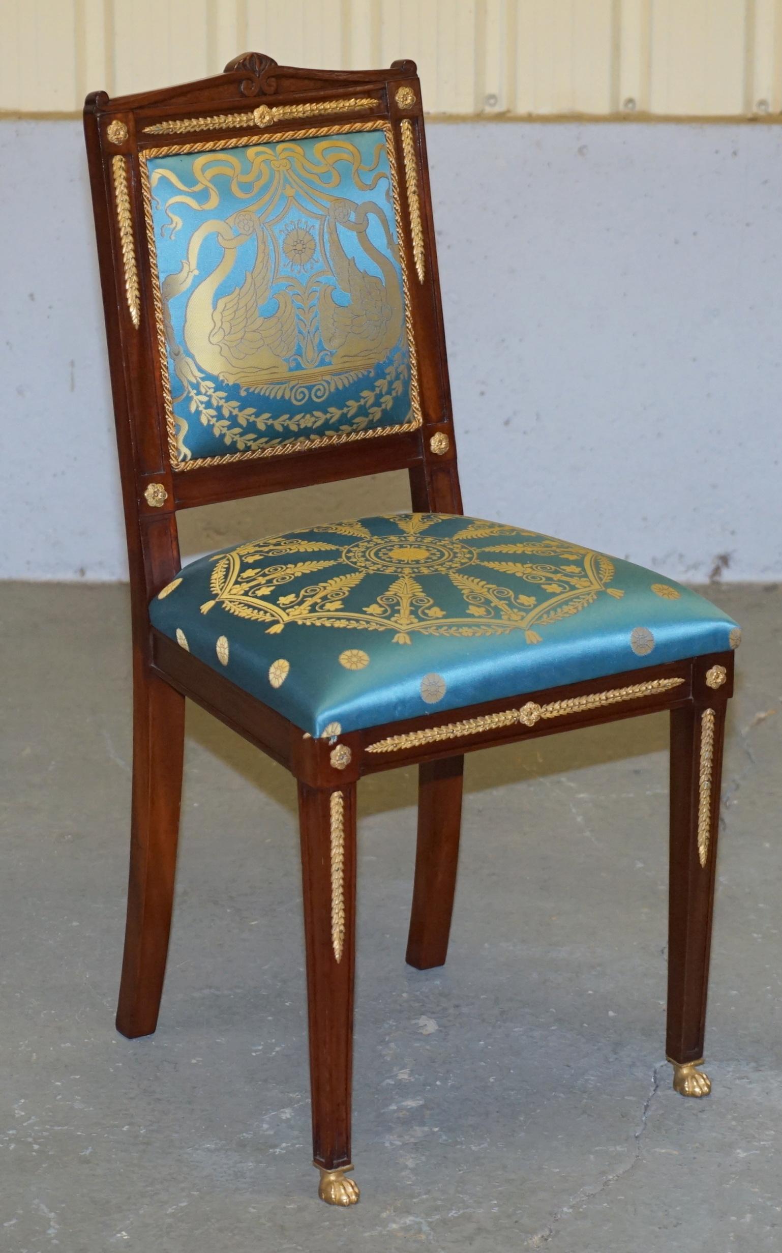 We are delighted to offer for sale this very fine suite of eight mahogany, gilt bronze and silk upholstered dining chairs in the French Napoleon III Empire style

The chairs are exceptional quality, circa 1900, the frames are all light mahogany,