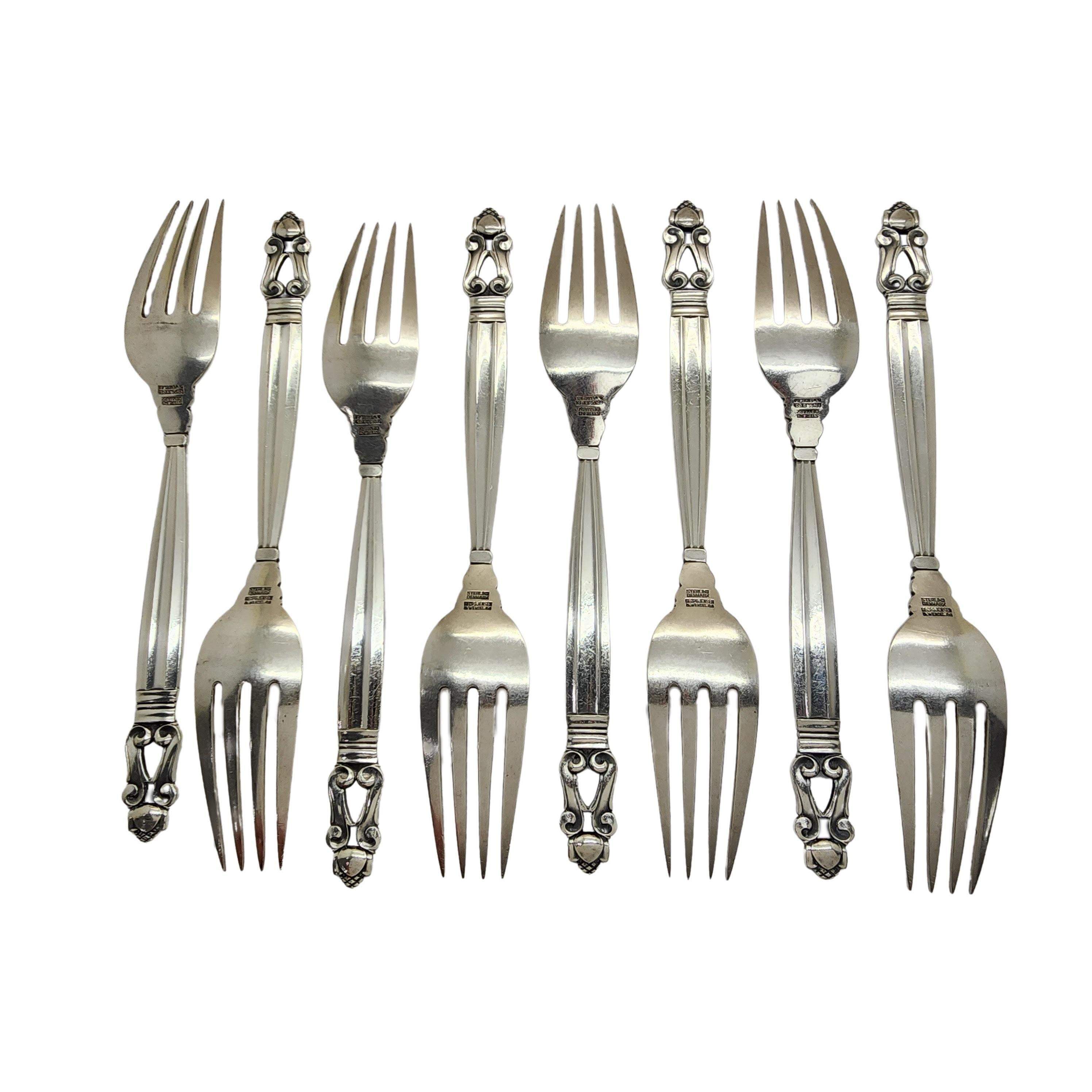 Set of 8 sterling silver dinner forks in the Acorn pattern by Georg Jensen.

The Acorn pattern was introduced in 1915 as a collaboration between Georg Jensen and designer Johan Ronde. The Acorn pattern, which combines Art Nouveau and Art Deco