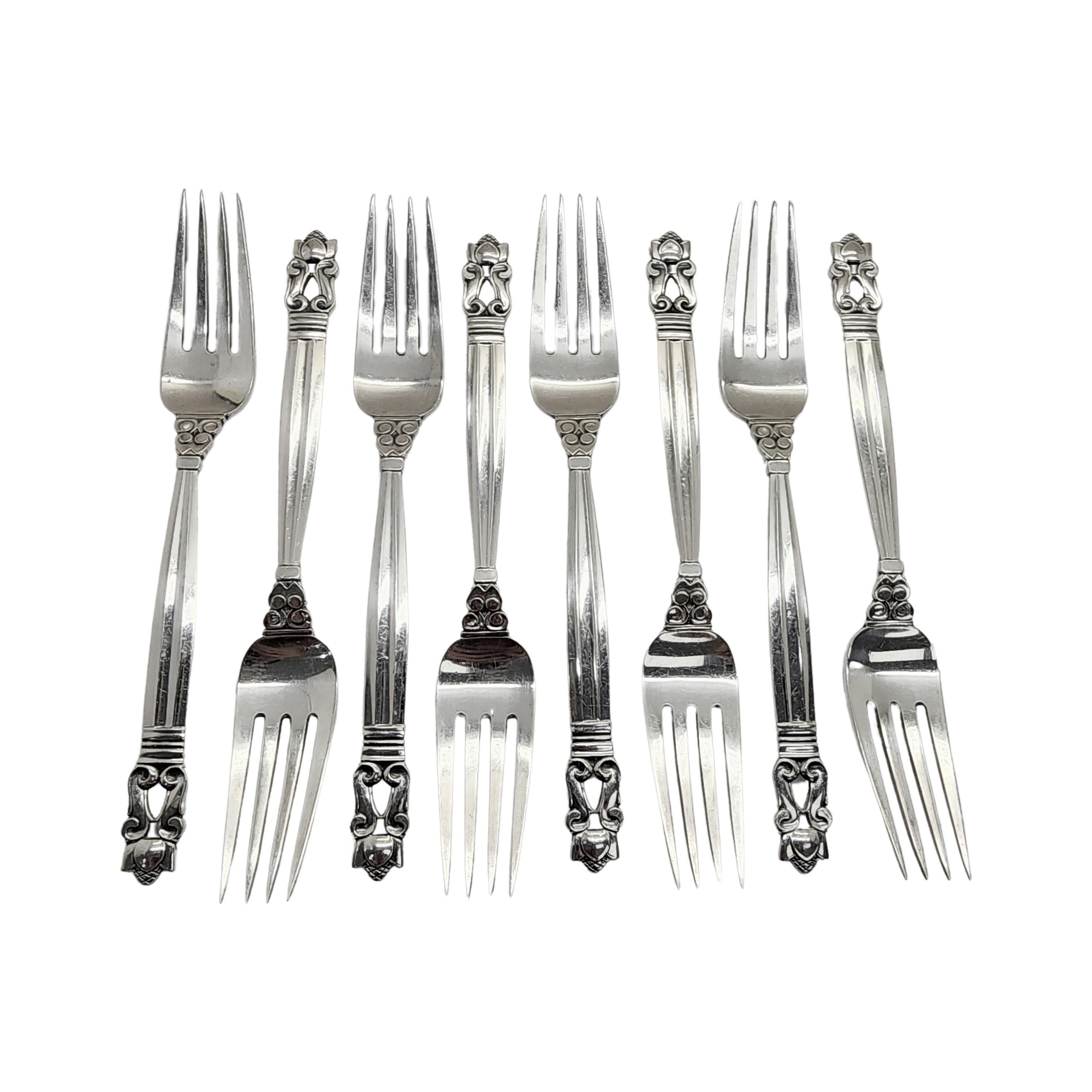 Set of 8 sterling silver forks in the Acorn pattern by Georg Jensen.

The Acorn pattern was introduced in 1915 as a collaboration between Georg Jensen and designer Johan Ronde. The Acorn pattern, which combines Art Nouveau and Art Deco styles, has