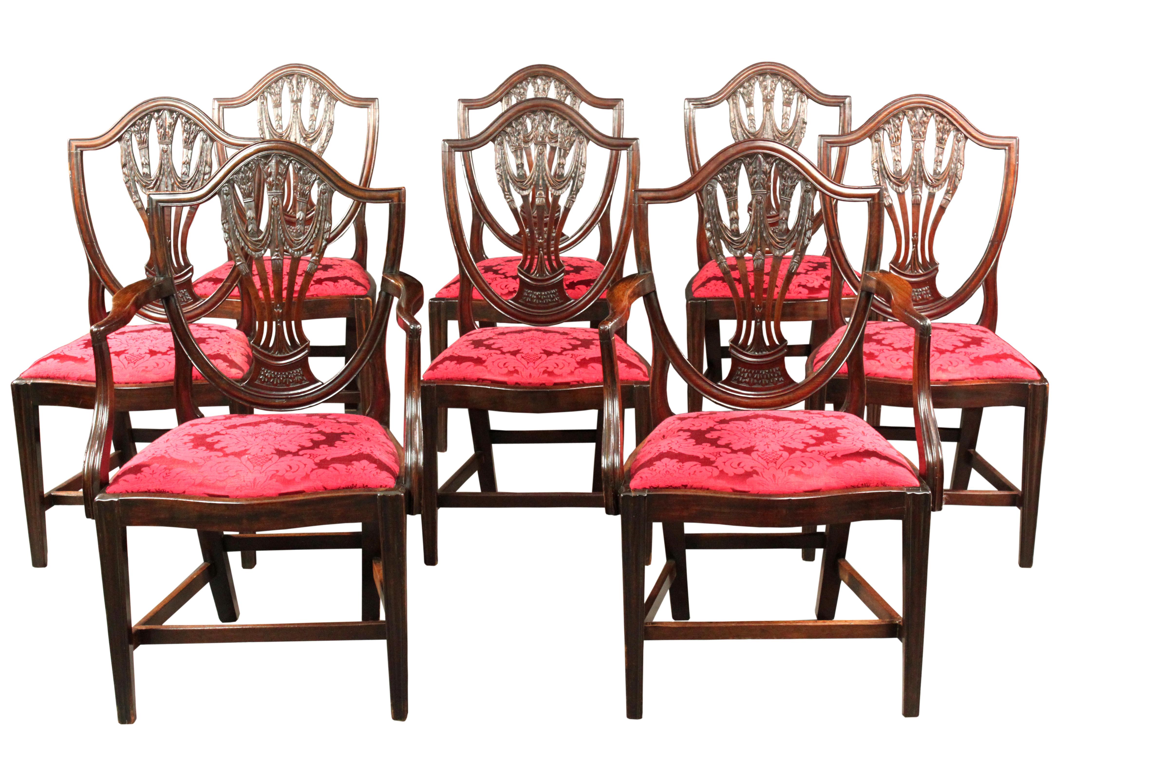 A fine quality set of 8 George III dining chairs with particularly well-carved shield backs, serpentine front rails and moulded front legs. Original condition and made in good quality, mahogany of a rich color and patina.
Provenance: from a