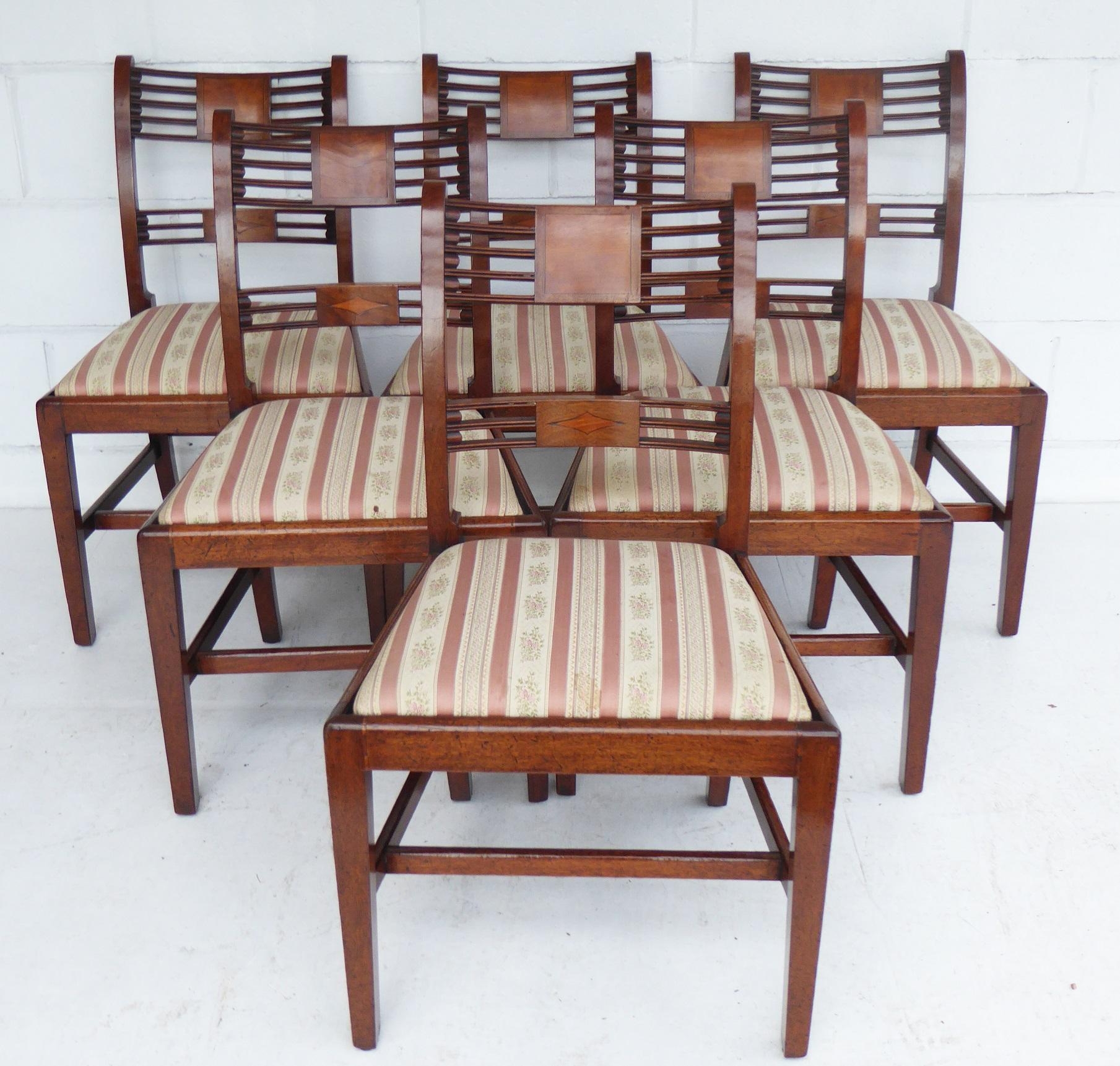 For sale is a good quality set of 8 George III mahogany dining chairs. The set consists of two carvers and six single chairs each with drop in seats, which could benefit from re-upholstery to match your decor. The chairs have all been restored and