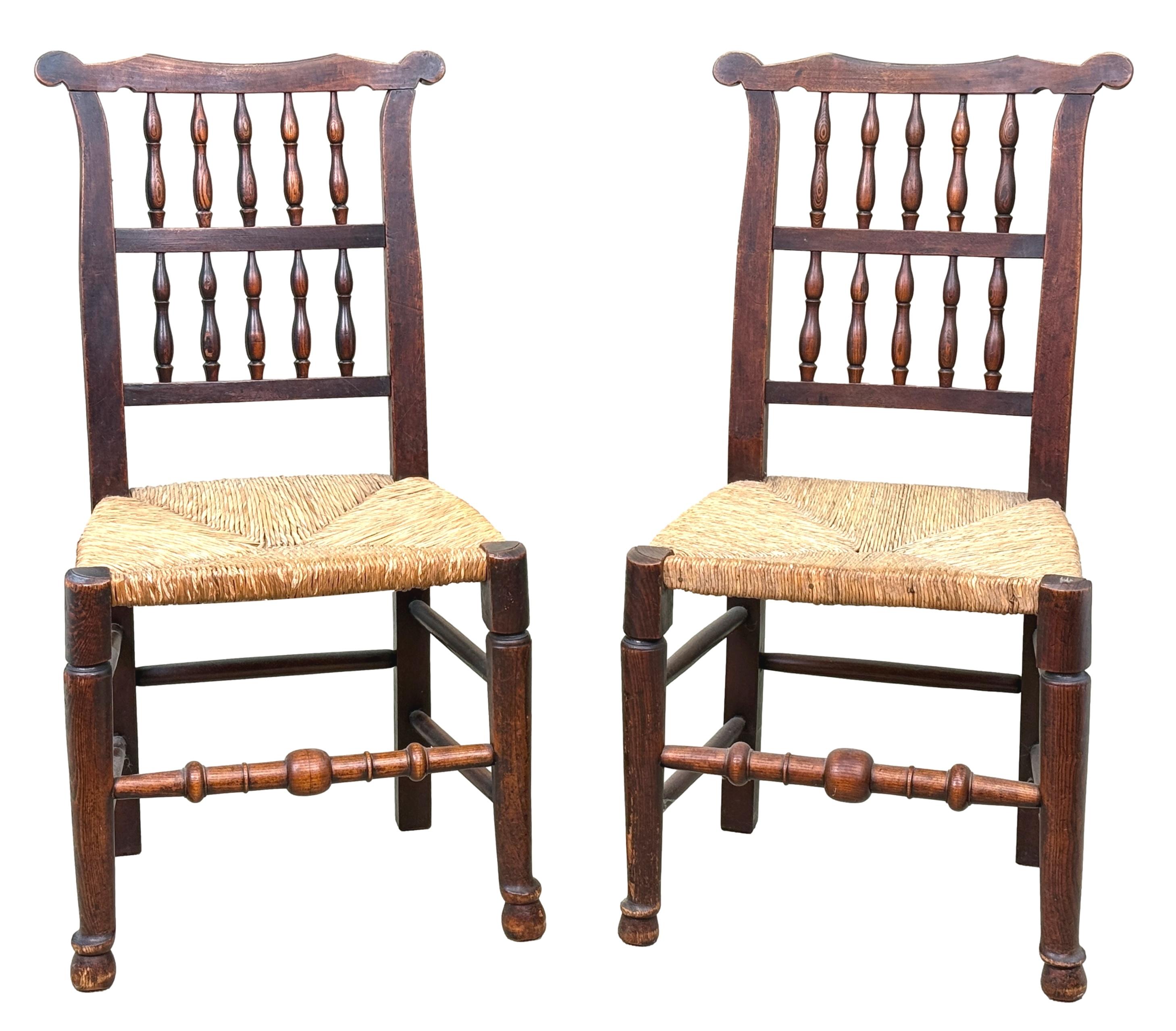 A Very Attractive Early 19th Century Georgian Period Harlequin Matched Set Of 8 Ash And Elm Farmhouse Kitchen Dining Chairs, Consisting 6 Single Chairs And 2 Armchairs, Having Rare Ears To Shaped Top Rails, Over Elegant Rowed Spindle Turned