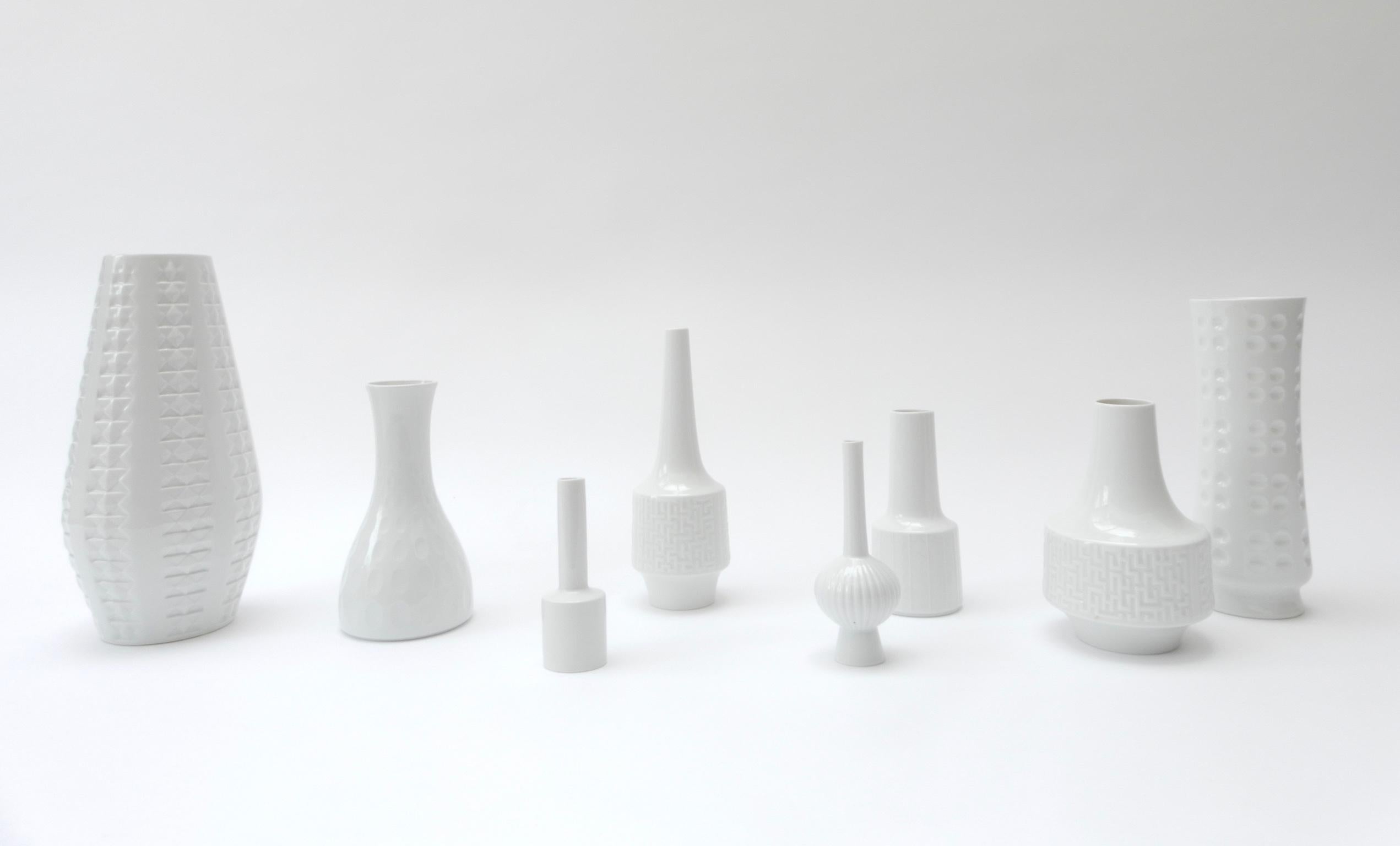 Set of 8 German white ceramic vases, 1960s.