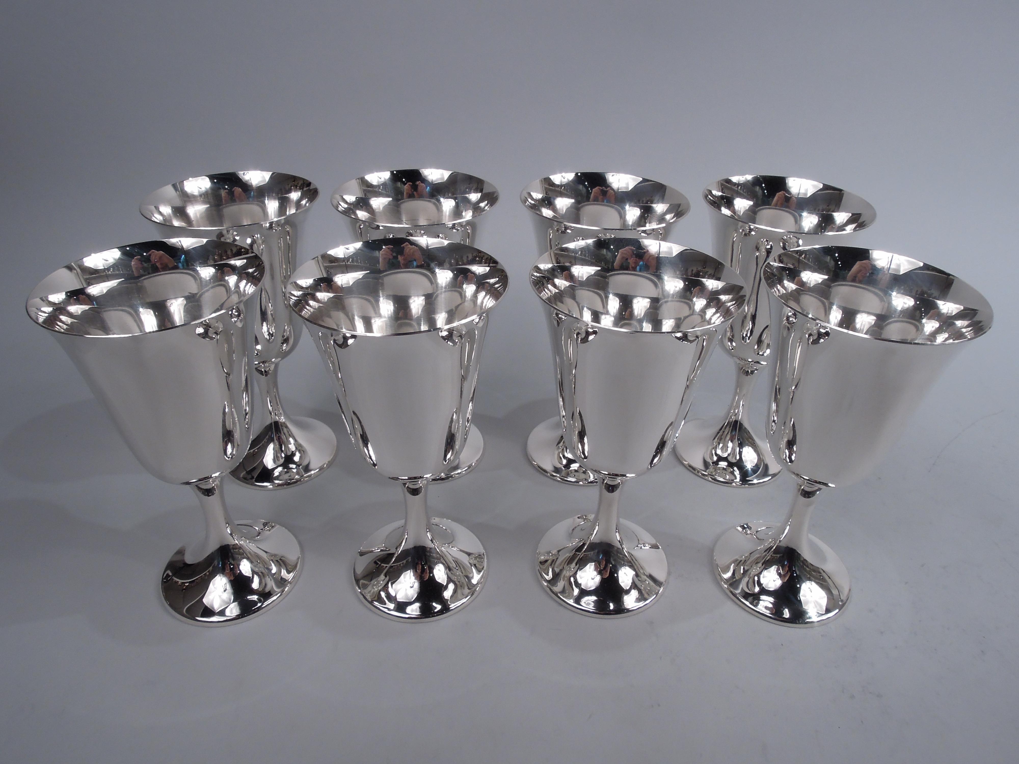 Set of 8 Puritan sterling silver goblets. Made by Gorham in Providence. Each: Spare and elegant form with subtle bell-form bowl on cylindrical stem flowing into raised foot. Works best when filled and refilled. Don’t be fooled by the pattern name. A