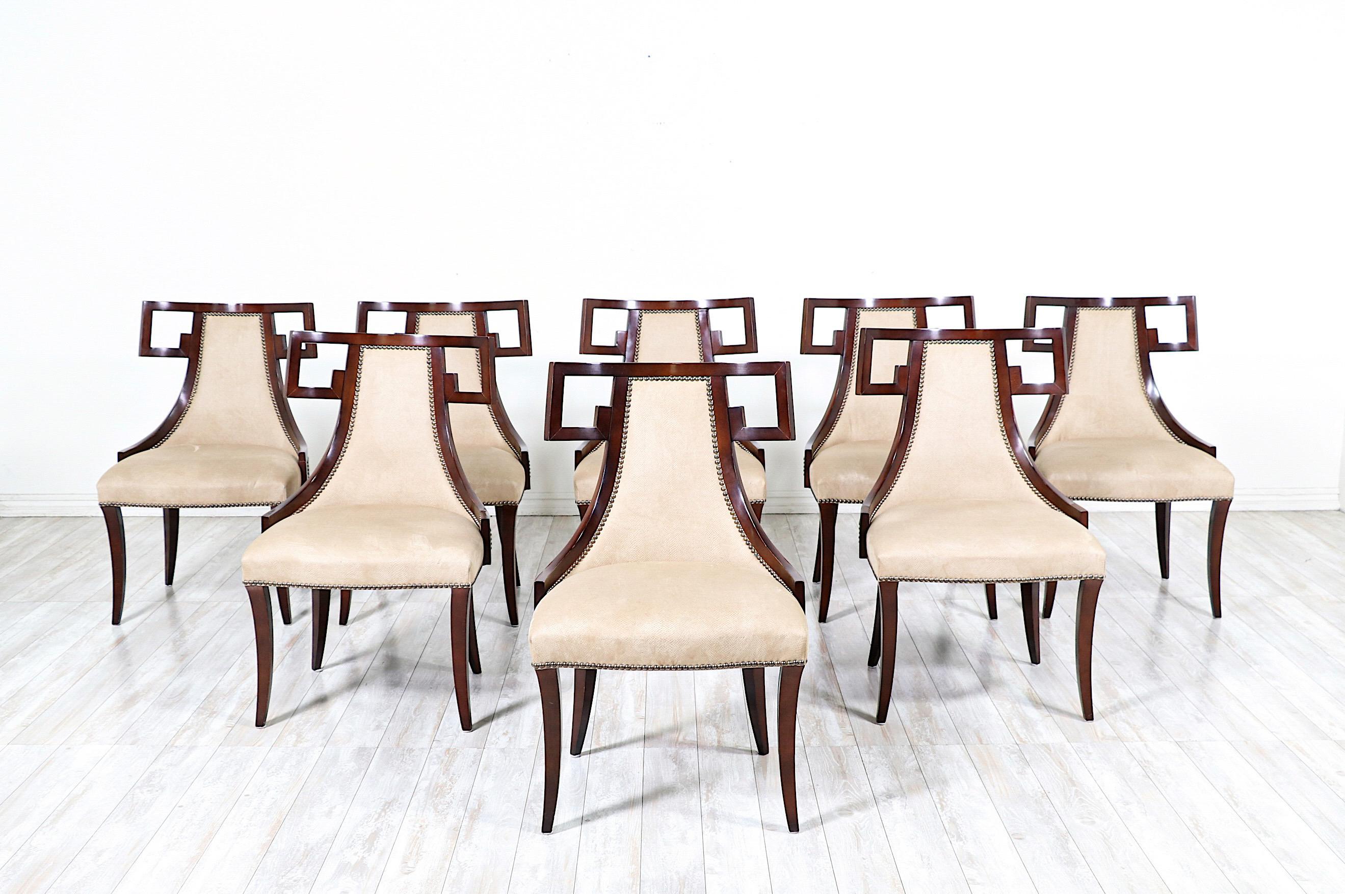 Fantastic, set of 8 “Greek” dining chairs designed by Thomas Pheasant for Baker Furniture. 

The “Greek” chair, model #7849, features clean, classic lines inspired by the timeless in design Greek klismos chairs of antiquity. 

The chairs retain