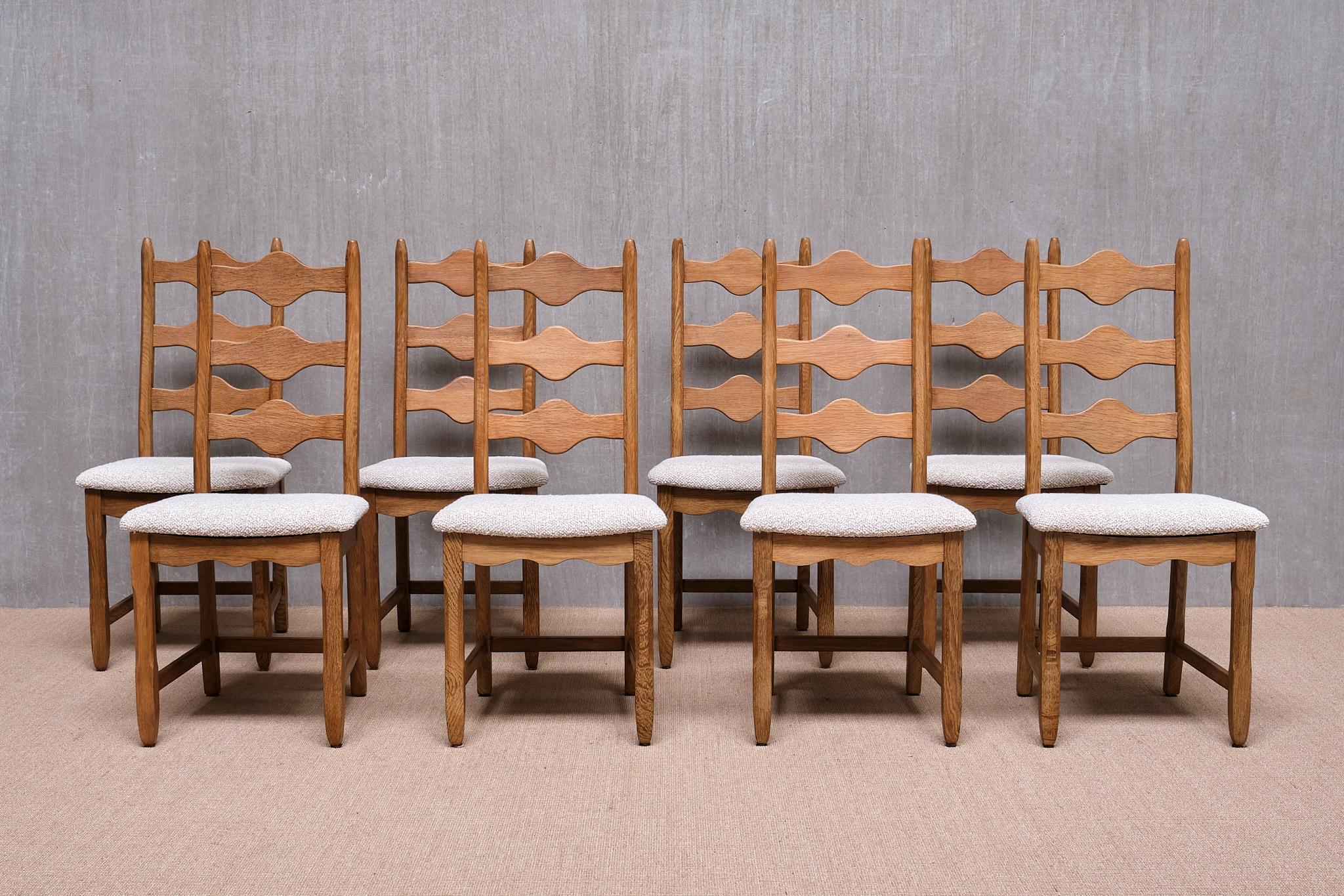 This striking set of eight dining chairs was designed by Henning (Henry) Kjærnulf in the 1960s. Produced by Nyrup Møbelfabrik in Denmark, these chairs represent a rare variant of Kjærnulf’s Razorblade series.

The set is crafted from solid oak,
