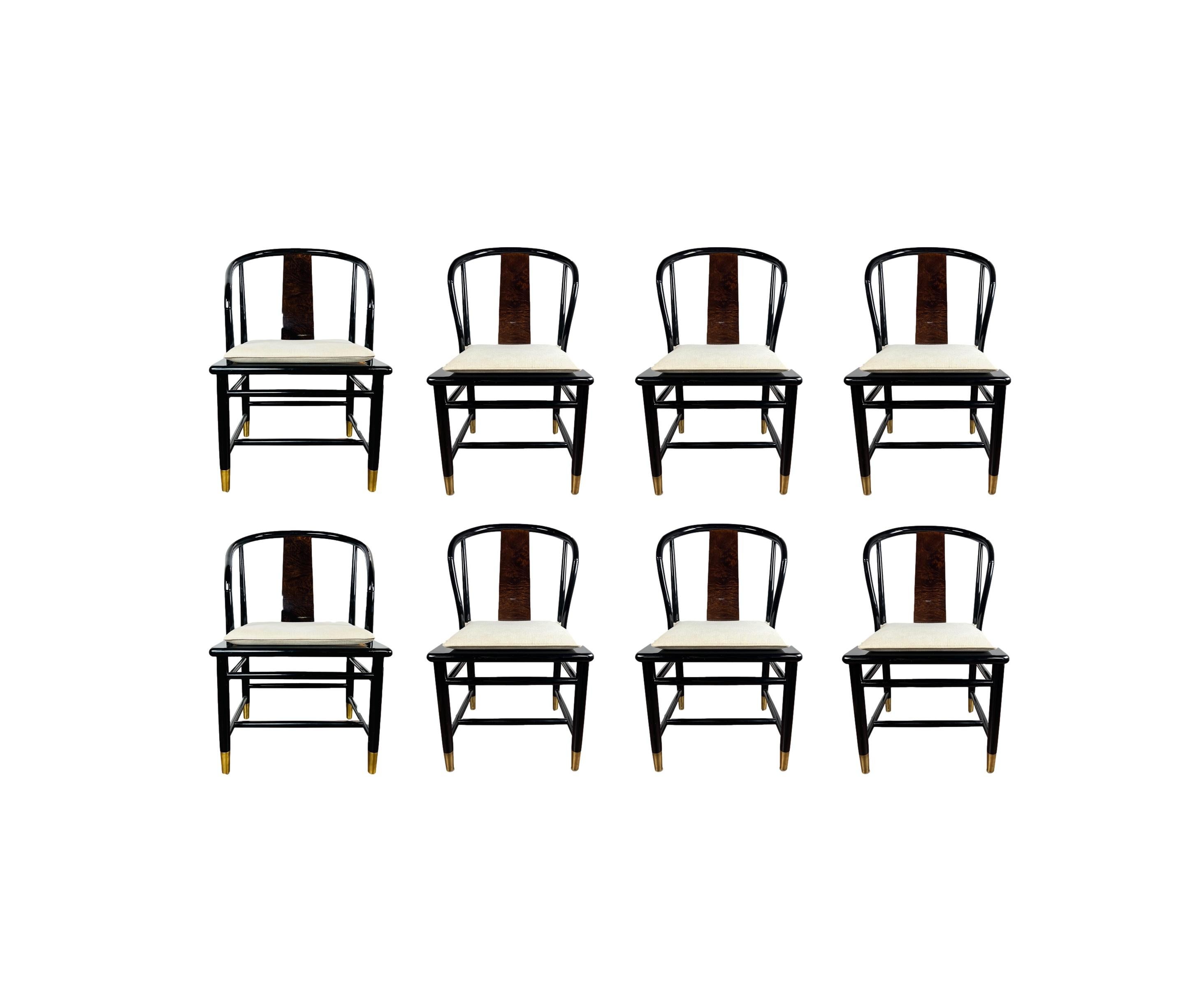 Set of 8 Henredon Scene Three dining chairs. These Asian influenced dining chairs feature glossy black lacquer frames with supportive undulating burledwood back with a natural caned seat (removable cushions included). The chairs finish in