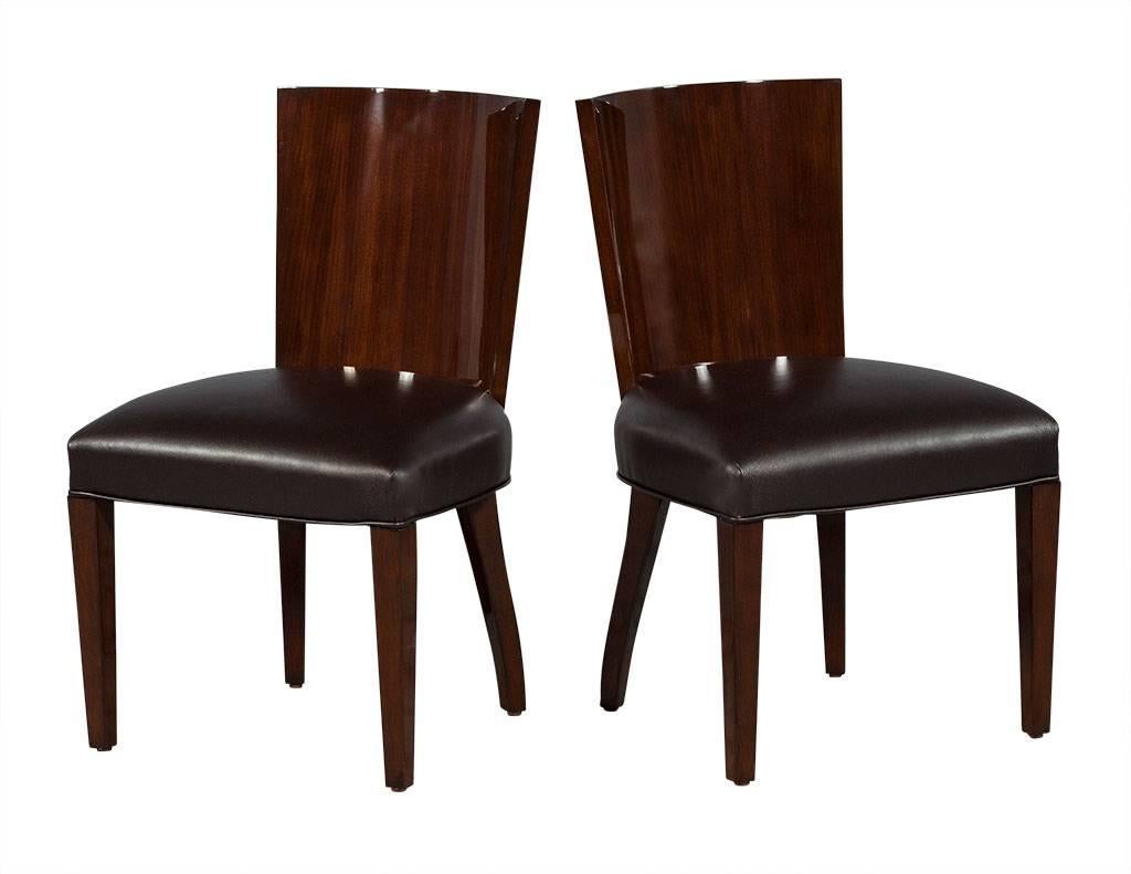 Set of 8 Hollywood Ralph Lauren leather dining chairs. These transitional style dining chairs are composed of dark brown lacquered wood with dark brown leather upholstered seats. The set includes eight side chairs. A gorgeous set perfect for a chic