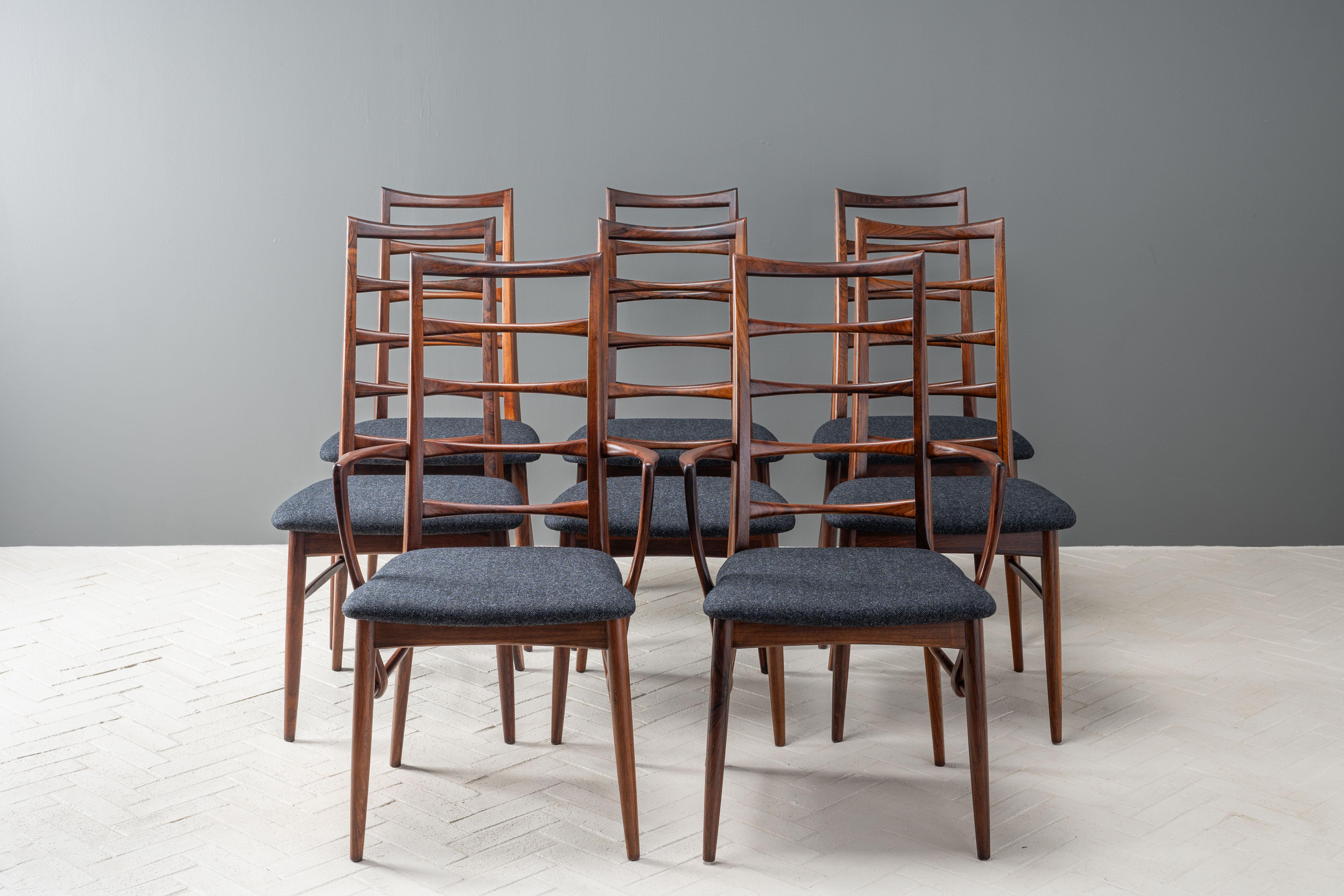 Denmark, ca. 1960s. An elegant and increasingly scarce set of eight Lis dining chairs by Niels Koefoed for Koefoeds Hornslet. Each features a finely made solid rosewood frame with ergonomic ladder back and nicely tapered legs. Includes two arm