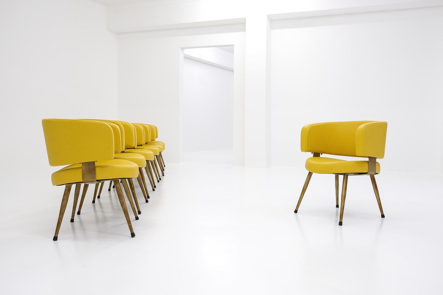 Late 20th Century Set of 8 Italian armchairs, newly upholstered in yellow leatherette & metal base For Sale