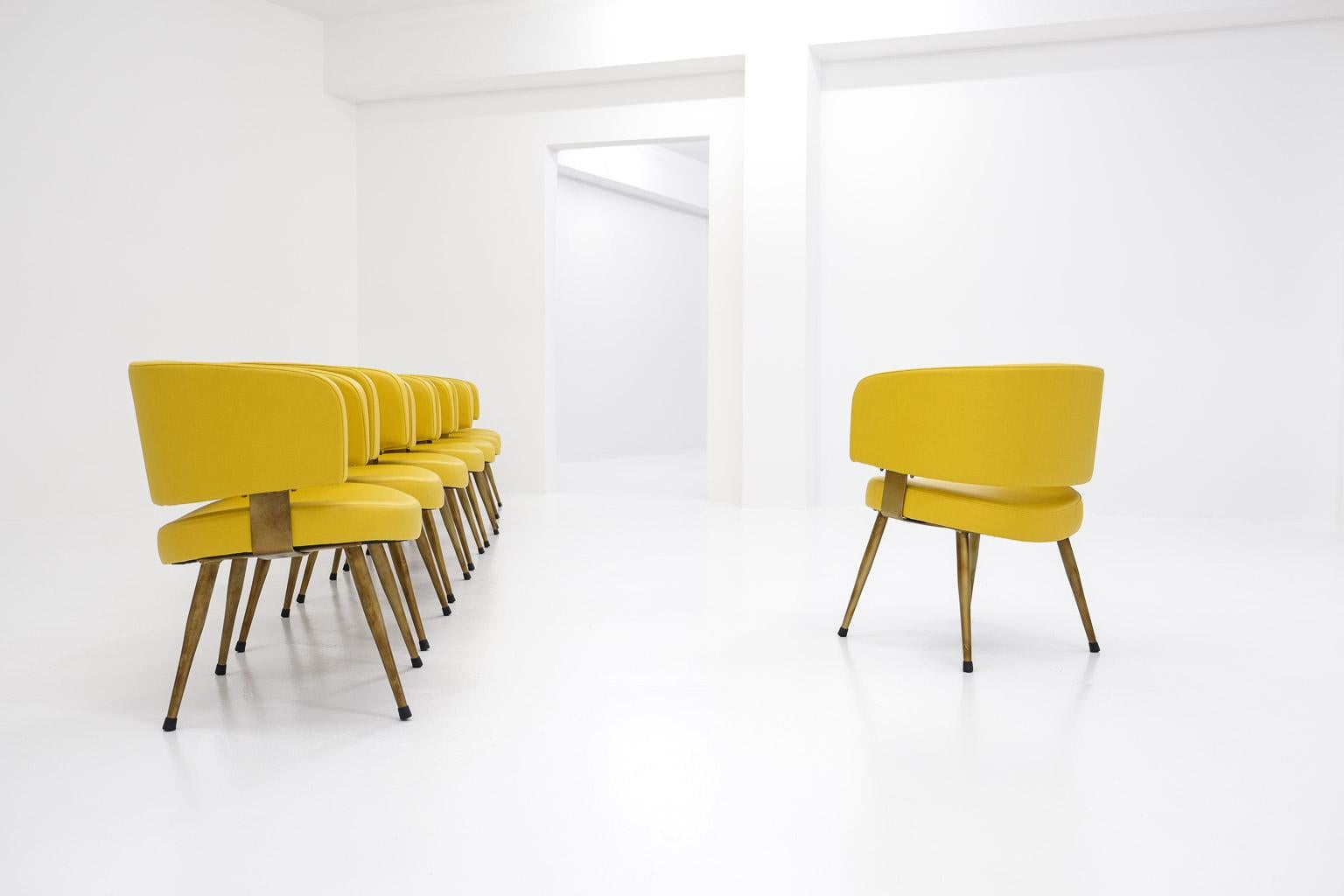 Set of 8 Italian armchairs, newly upholstered in yellow leatherette & metal base For Sale 1