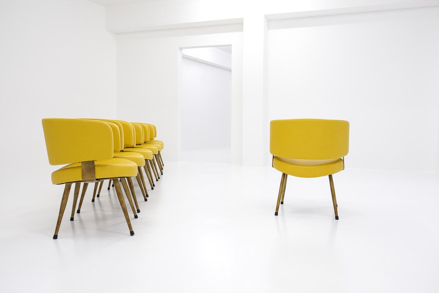 Set of 8 Italian armchairs, newly upholstered in yellow leatherette & metal base For Sale 2