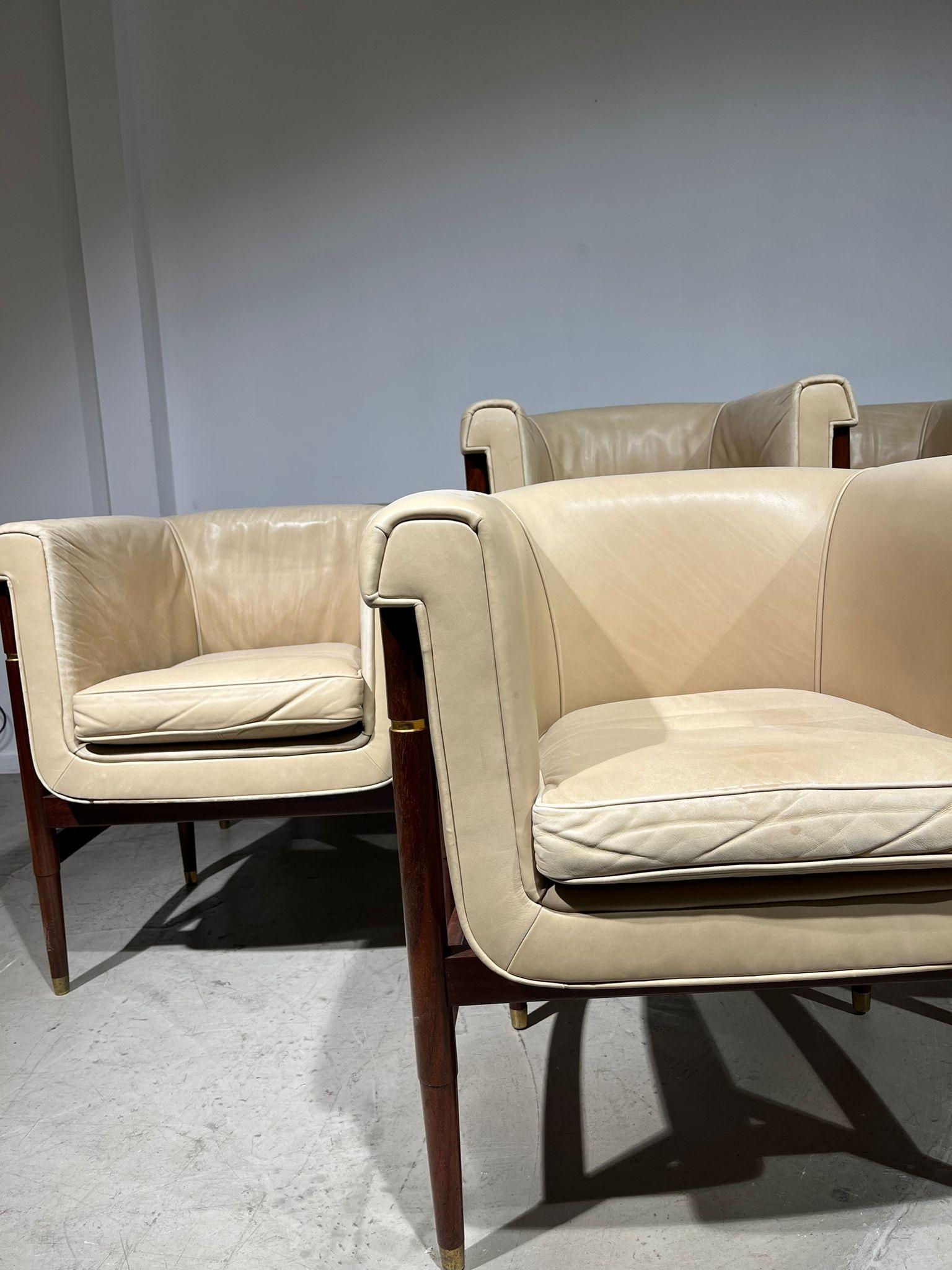 Rare set 8 Italian dining easychairs with brown wood structure and cream leather seat. Brass details on the legs. Very comfy !