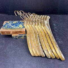 Set of Eight Vintage Italian Florentine Gilt Wood Clothing Hangers, 1960s