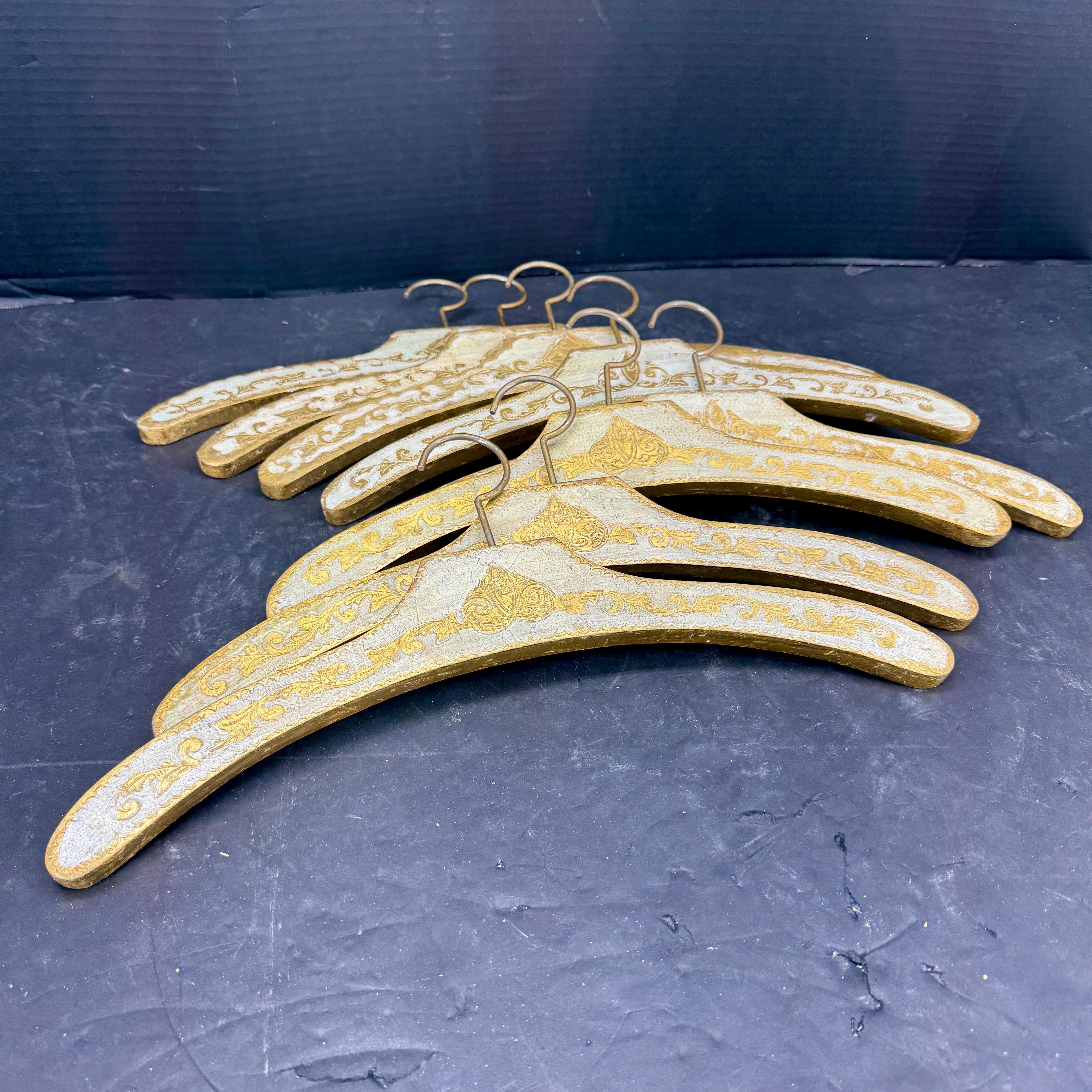 Hand-Crafted Set of 8 Italian Florentine Gilt Wood Clothing Hangers For Sale