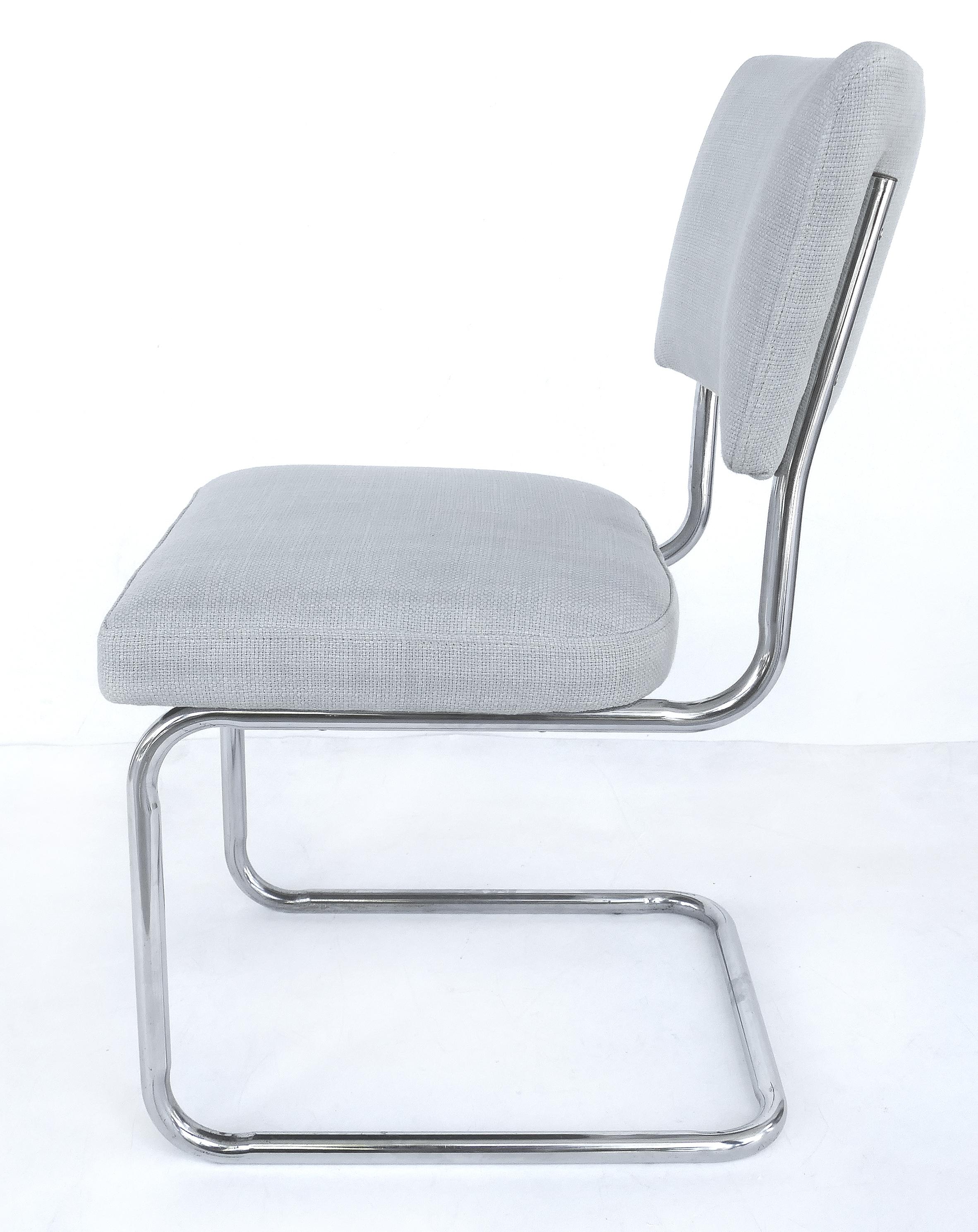 Set of 8 Italian tubular chrome dining chairs, new upholstery and cantilevered

Offered for sale is a set of eight Italian tubular chrome cantilevered dining chairs which have been newly upholstered in a light grey linen blend fabric.