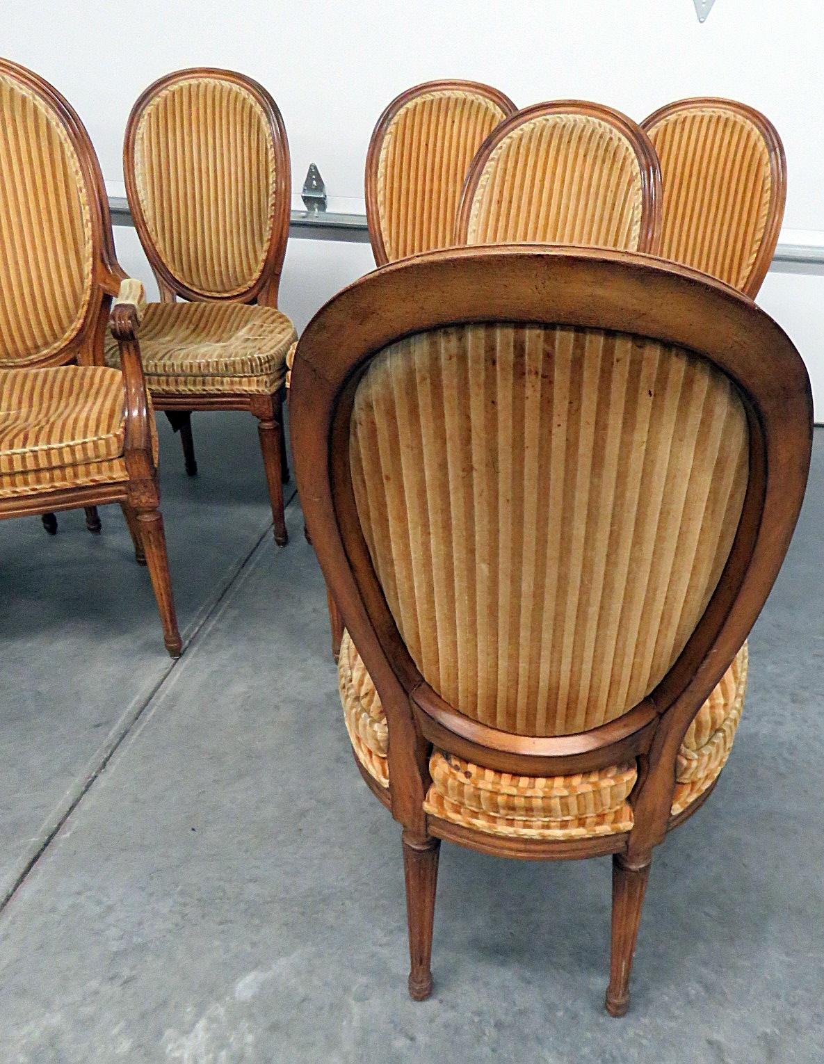 Set of 8 Jansen style dining chairs. The 2 armchairs measure 39.75