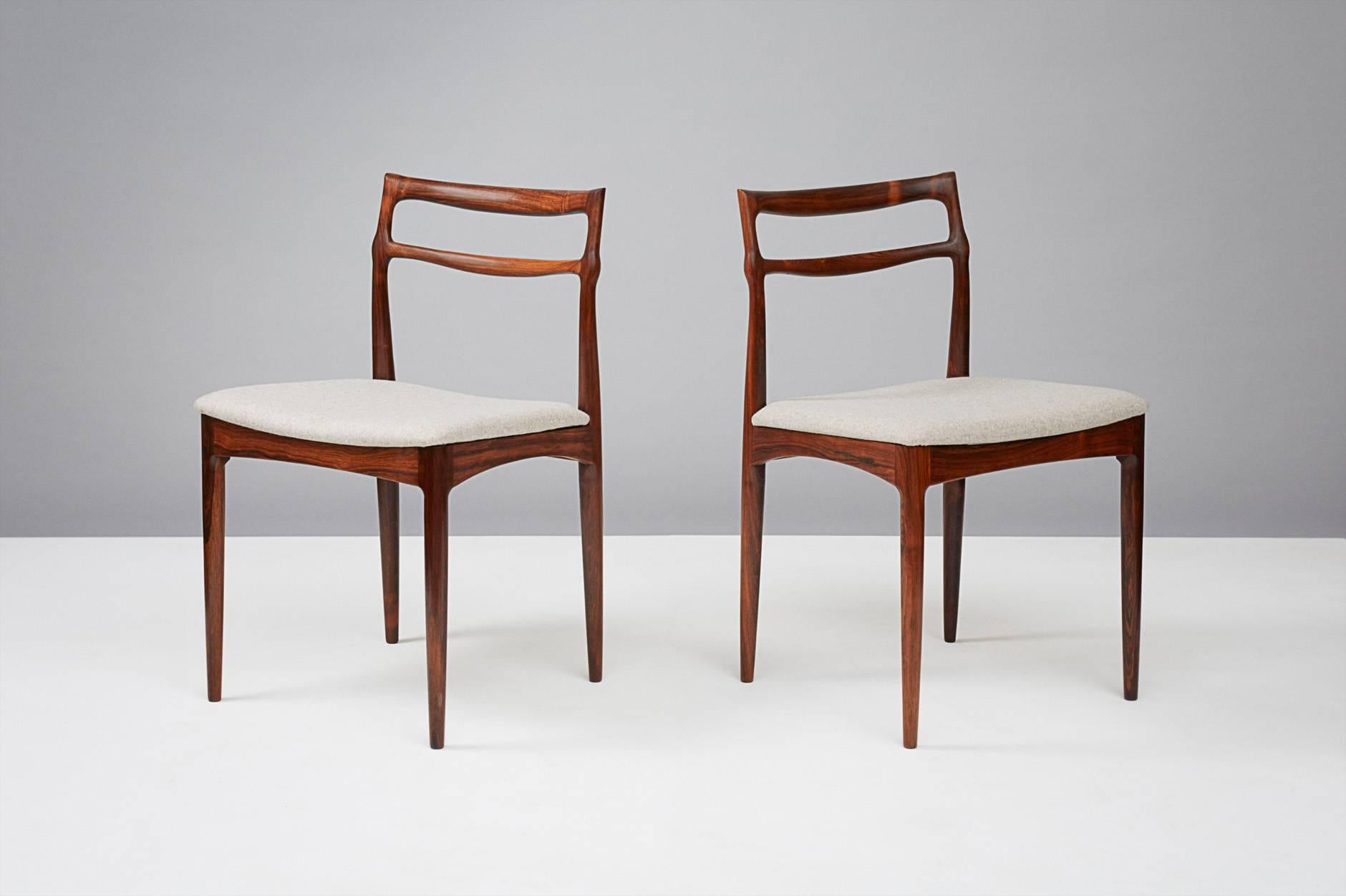 Johannes Andersen (1903-1991)

Rosewood dining chairs, produced circa 1960s

Sculptural Brazilian rosewood dining chairs produced by the Christian Linneberg Furniture Factory, Denmark. Seats reupholstered in Kvadrat Divina wool felt. 

