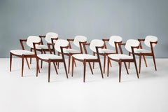 Set of 8 Kai Kristiansen Model 42 Off-White Boucle Dining Chairs