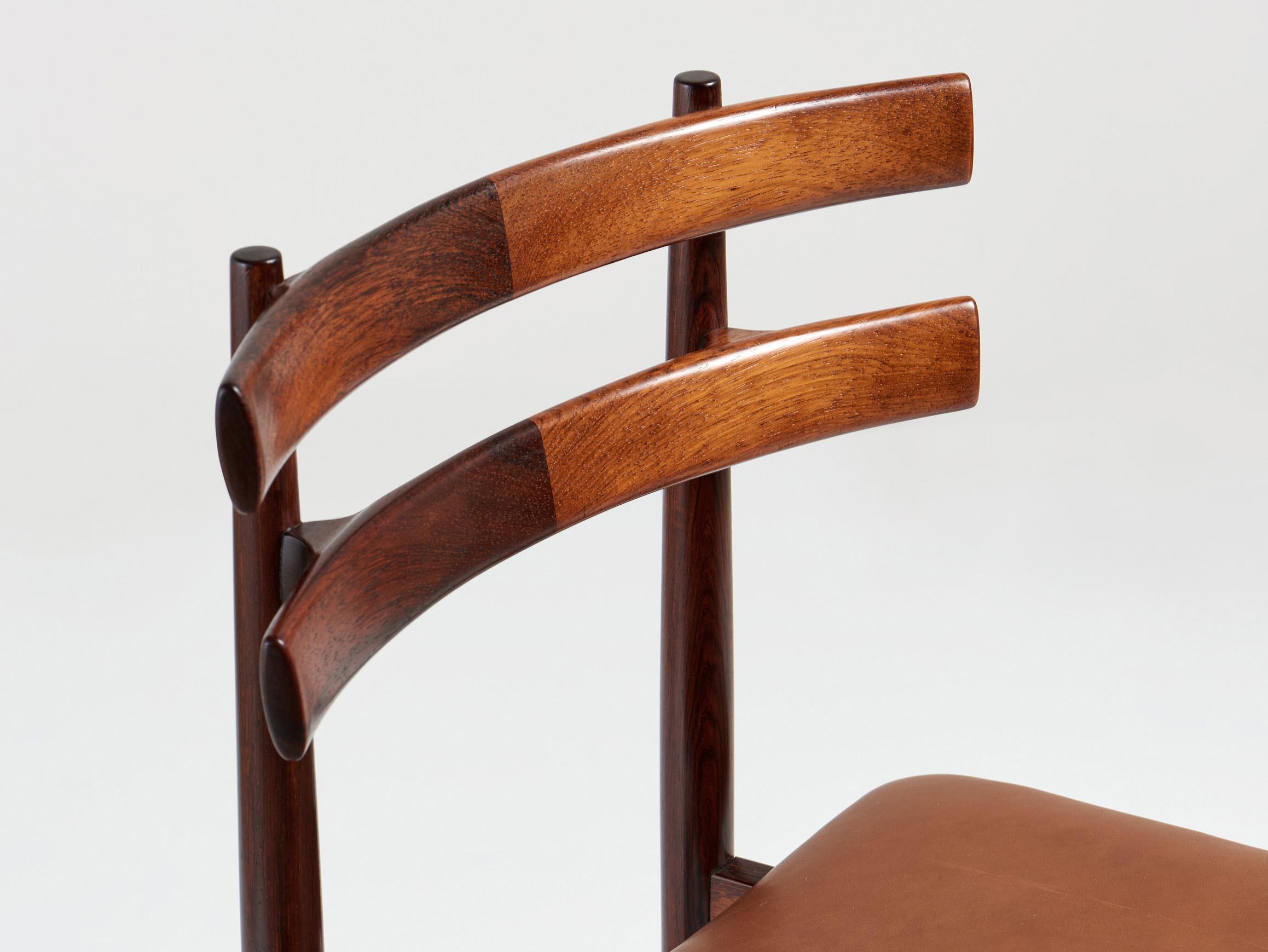 Metà XX secolo Set di 8 sedie da pranzo in legno di palissandro Kai Kristiansen Model 55 anni '60 circa in vendita