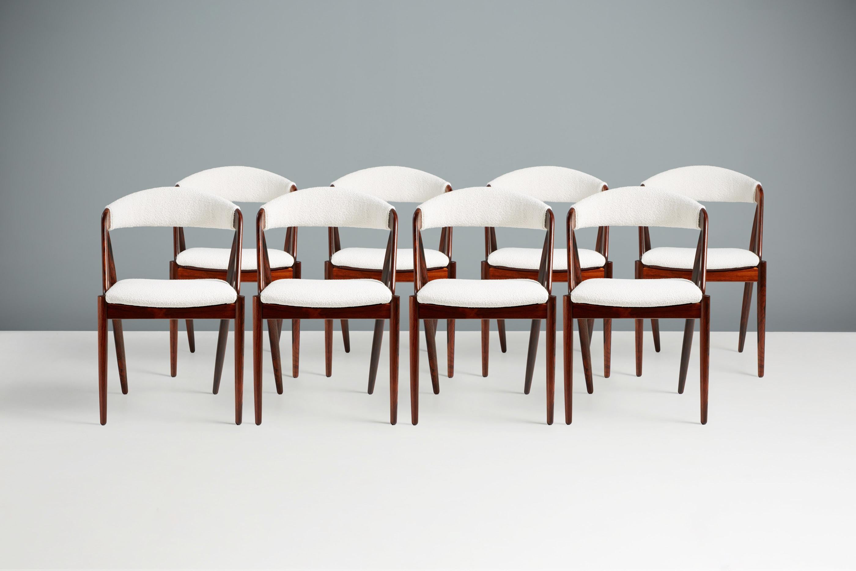 Kai Kristiansen - Model 31 Dining Chairs

Dining chairs produced by Skovman Andersen Mobelfabrik in the early 1960s. The gorgeous rosewood frames have been refinished in Danish oil with the seat and back reupholstered in premium, cotton-wool blend
