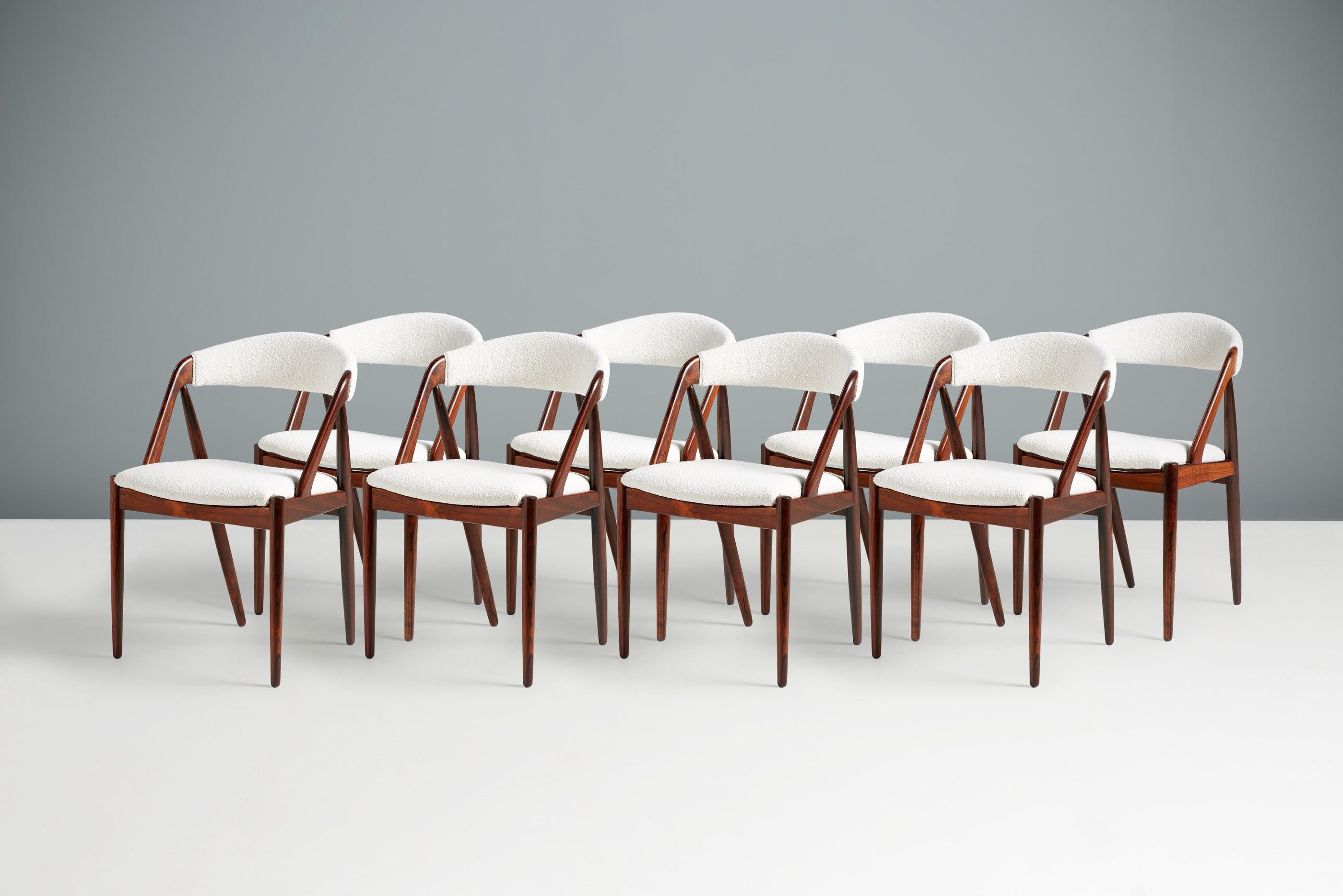 Scandinavian Modern Set of 8 Kai Kristiansen Rosewood & Boucle Model 31 Dining Chairs For Sale