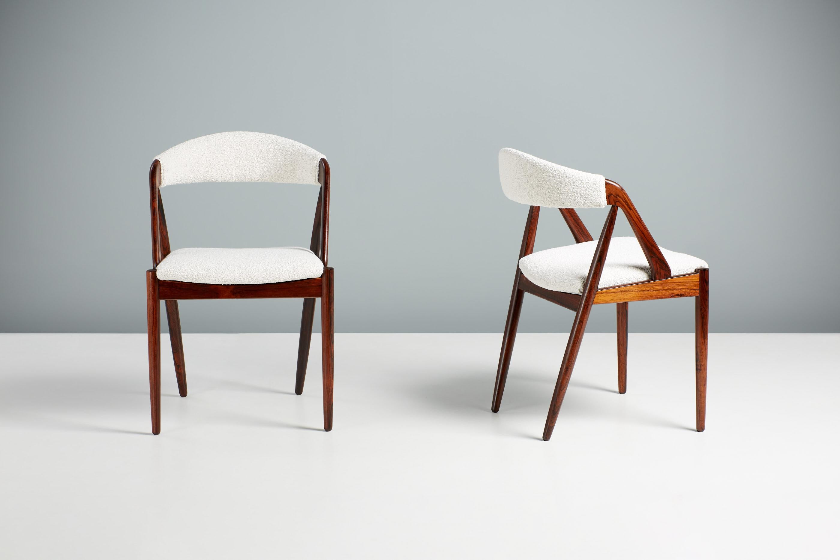 Mid-20th Century Set of 8 Kai Kristiansen Rosewood & Boucle Model 31 Dining Chairs For Sale