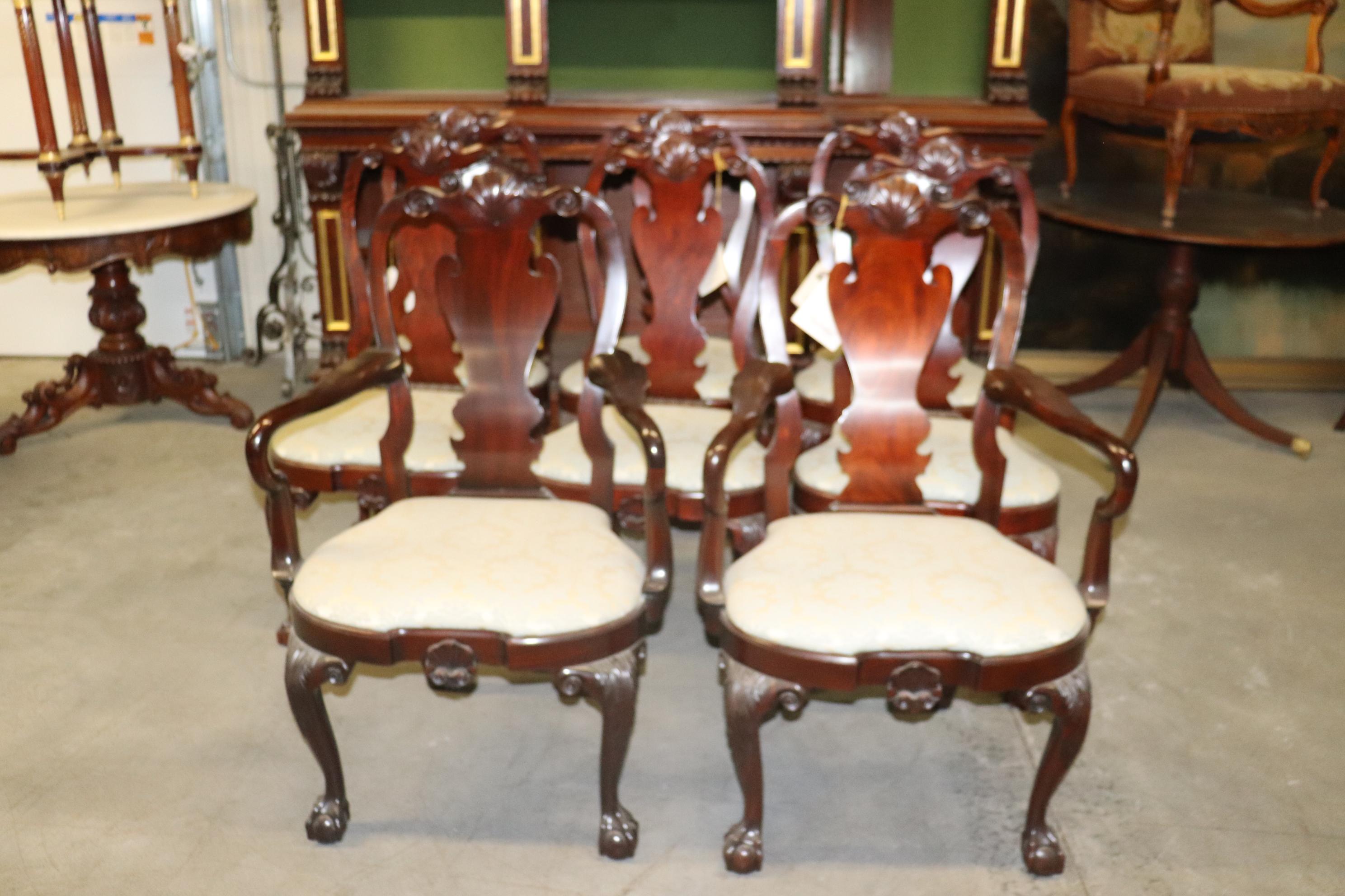 This is a fantastic set of Kindel dining chairs that faithfully reproduce the original chairs found in the Wintherthur nuseum. The chairs feature good upholstery with minimal signs of use and minor stains on one or two chairs that can probably be