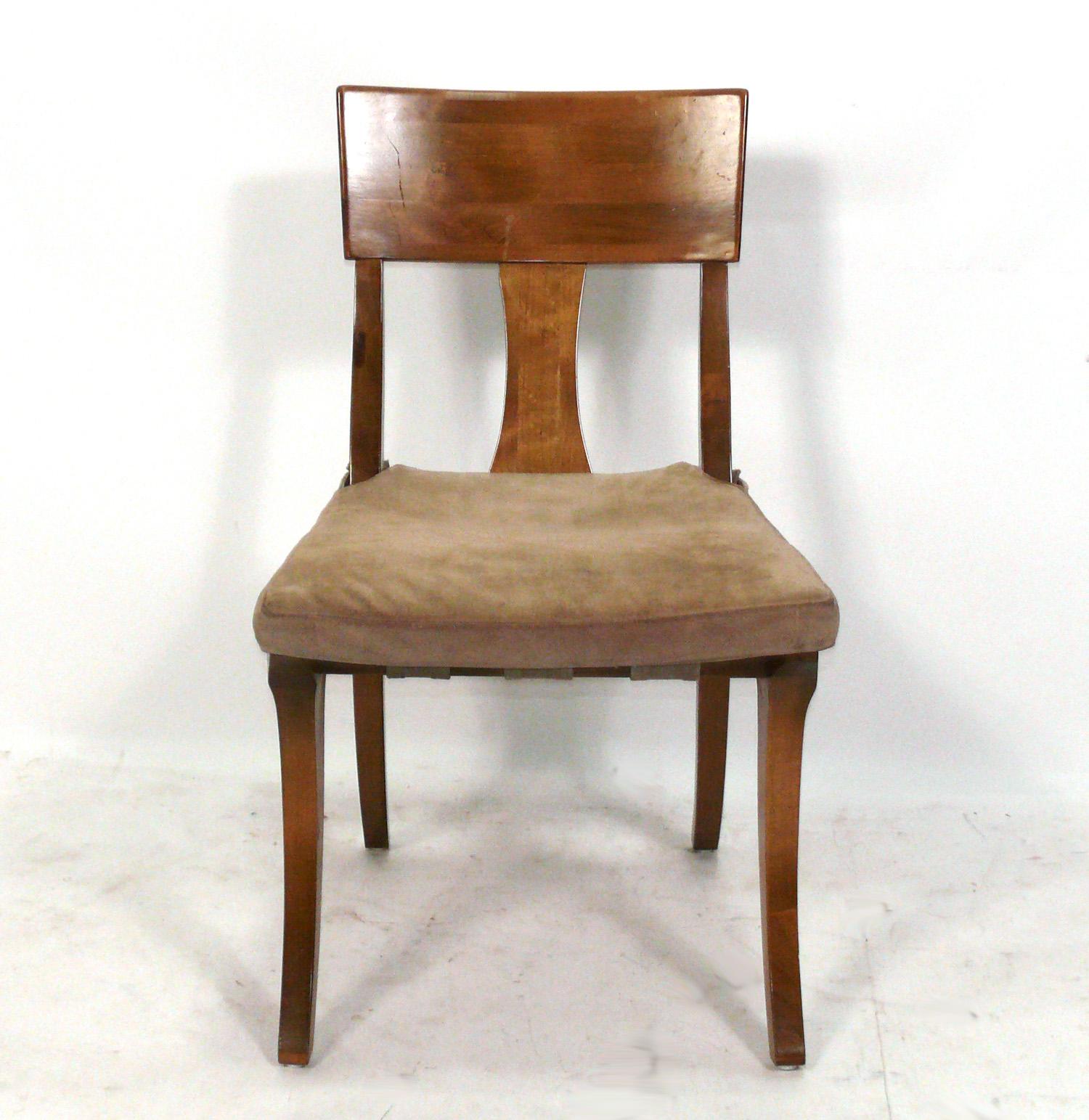 Set of Eight Klismos Dining Chairs, in the manner of T.H. Robsjohn Gibbings, and made by Kreiss, circa 2000s. The seat cushions are currently being reupholstered and can be completed in your fabric. SImply send us 6 yards total of your fabric after