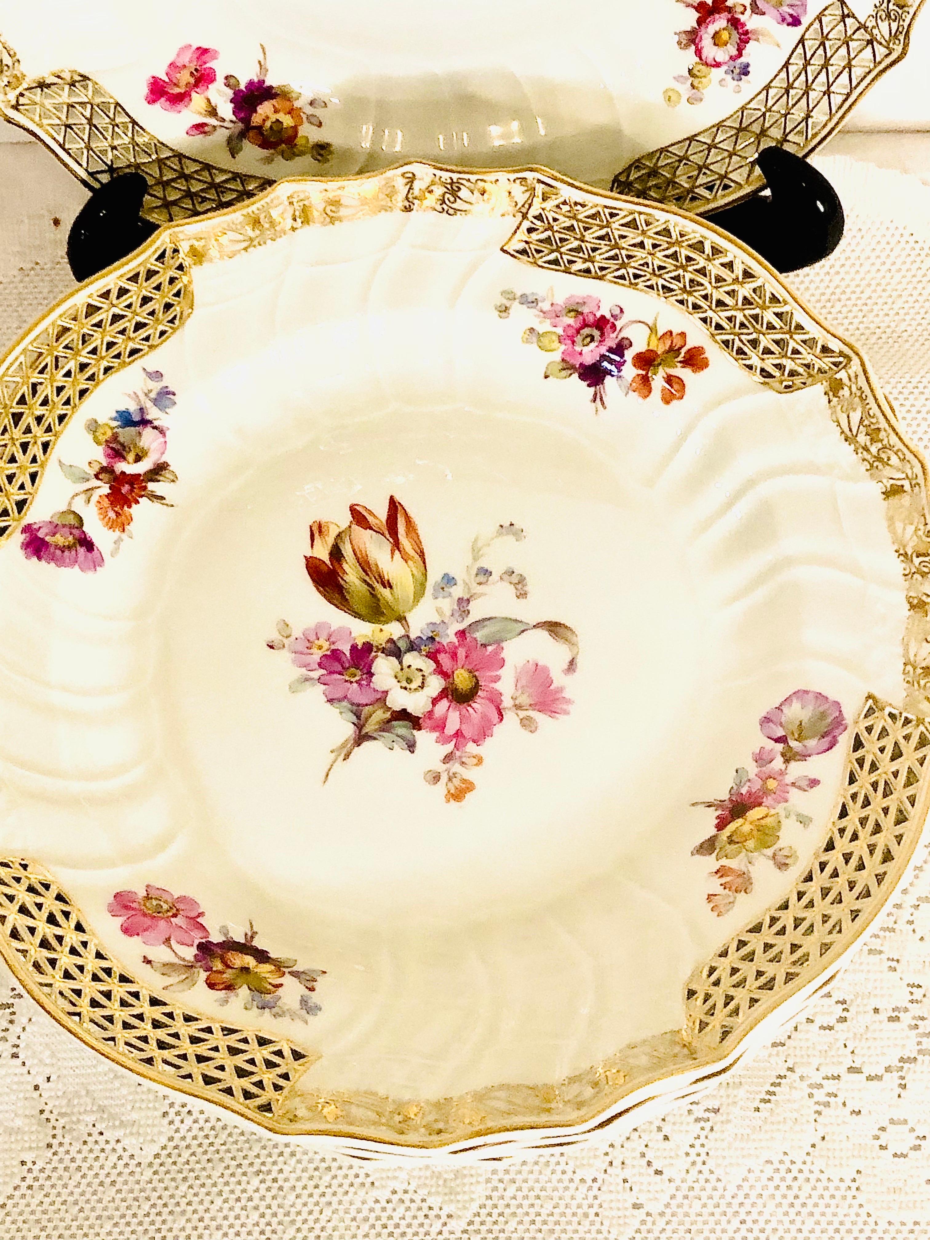 Set of eight rare KPM dinner plates with different museum quality hand-painted floral bouquets on each plate. KPM is also known as the Konigliche Porzellan-Manufaktur of Germany. They had very talented artists who did an outstanding job of painting