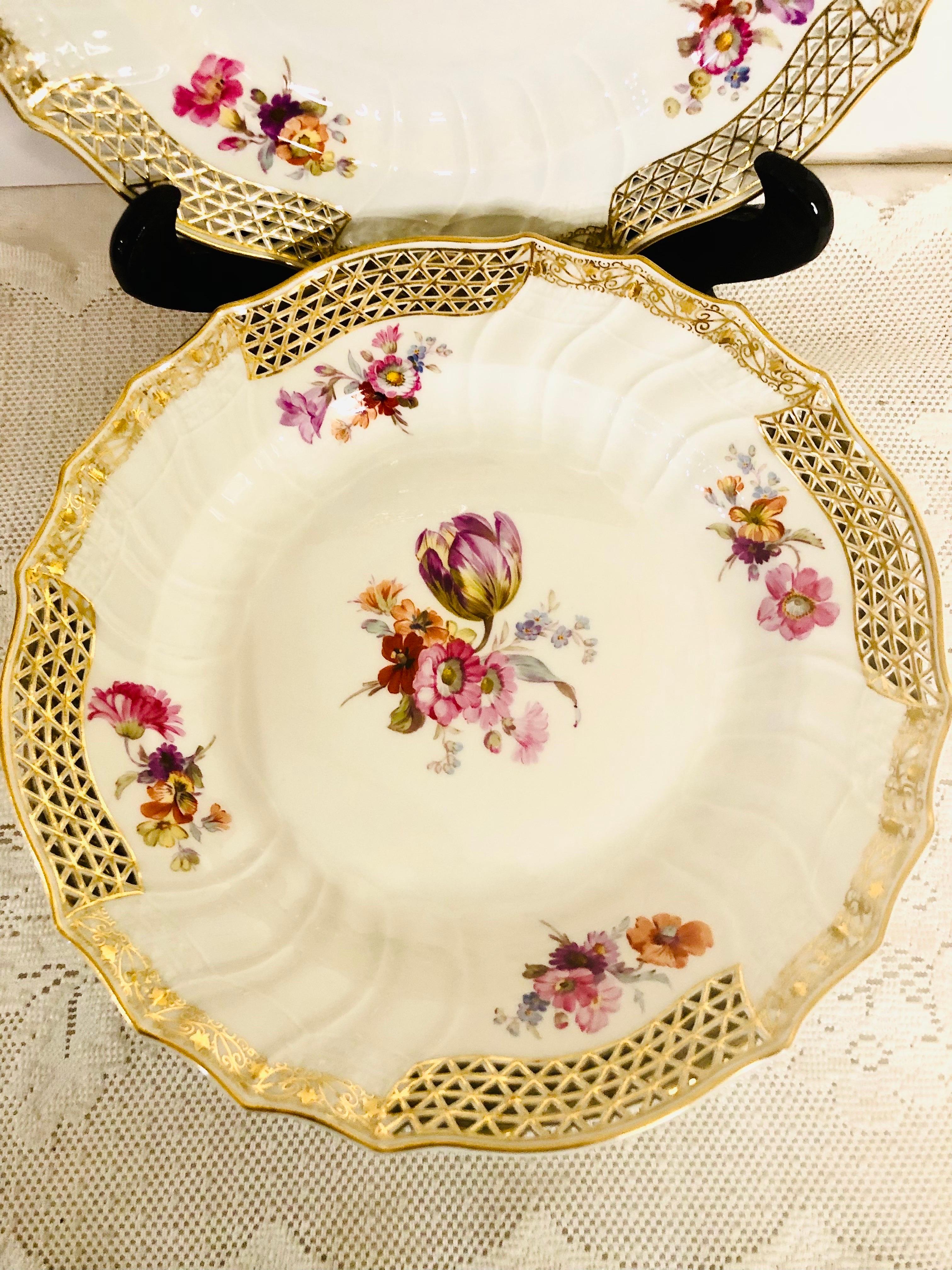 Hand-Painted Set of 8 KPM Dinner Plates with Reticulated Border And Different Flower Bouquets For Sale