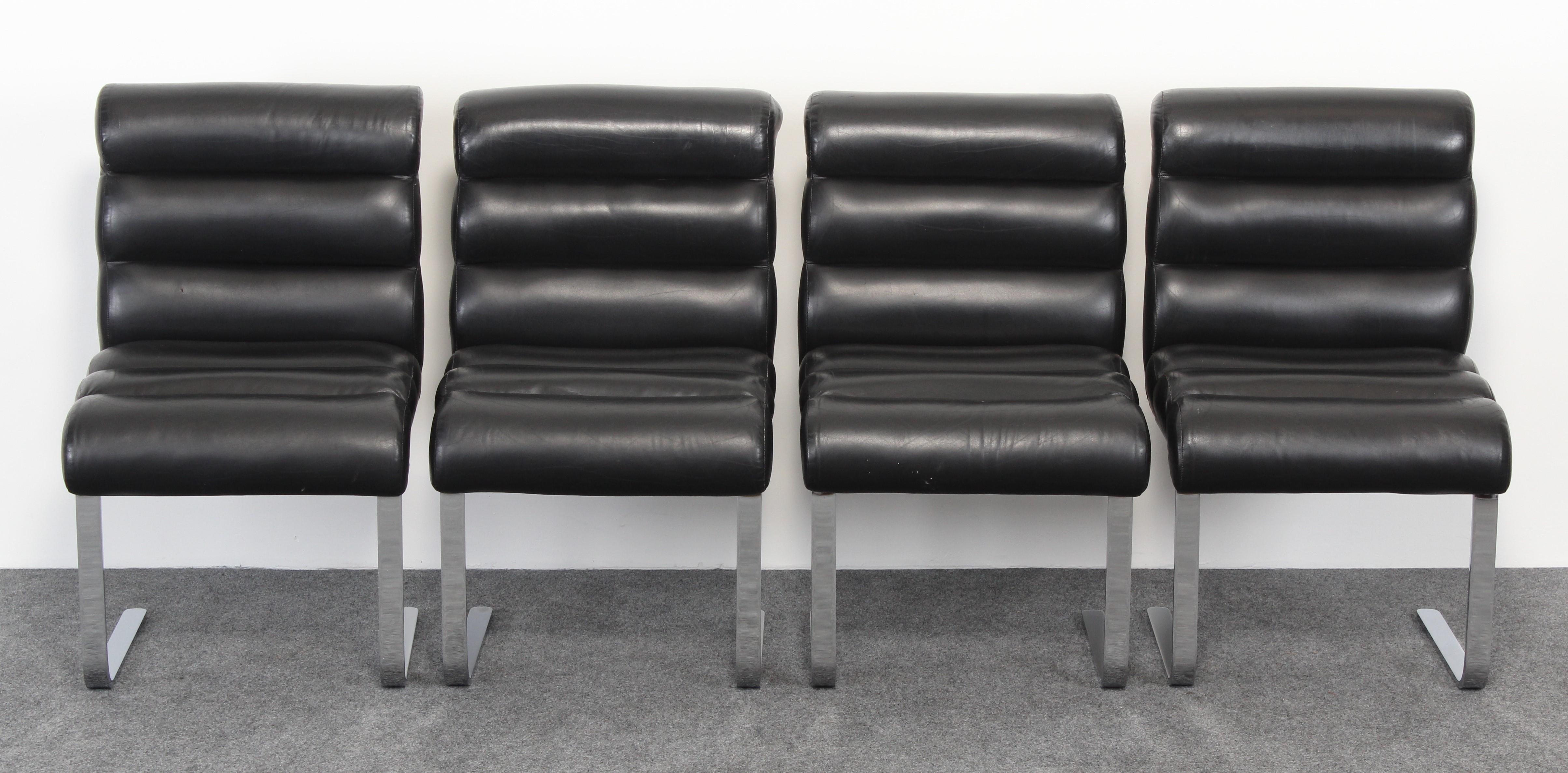 A comfortable set of 8 leather and chrome Cantilever chairs by Preview Furniture, circa 1980s. The chairs have the original black supple leather. The leather and chrome are in very good condition with age appropriate wear for 30 to 40 year old