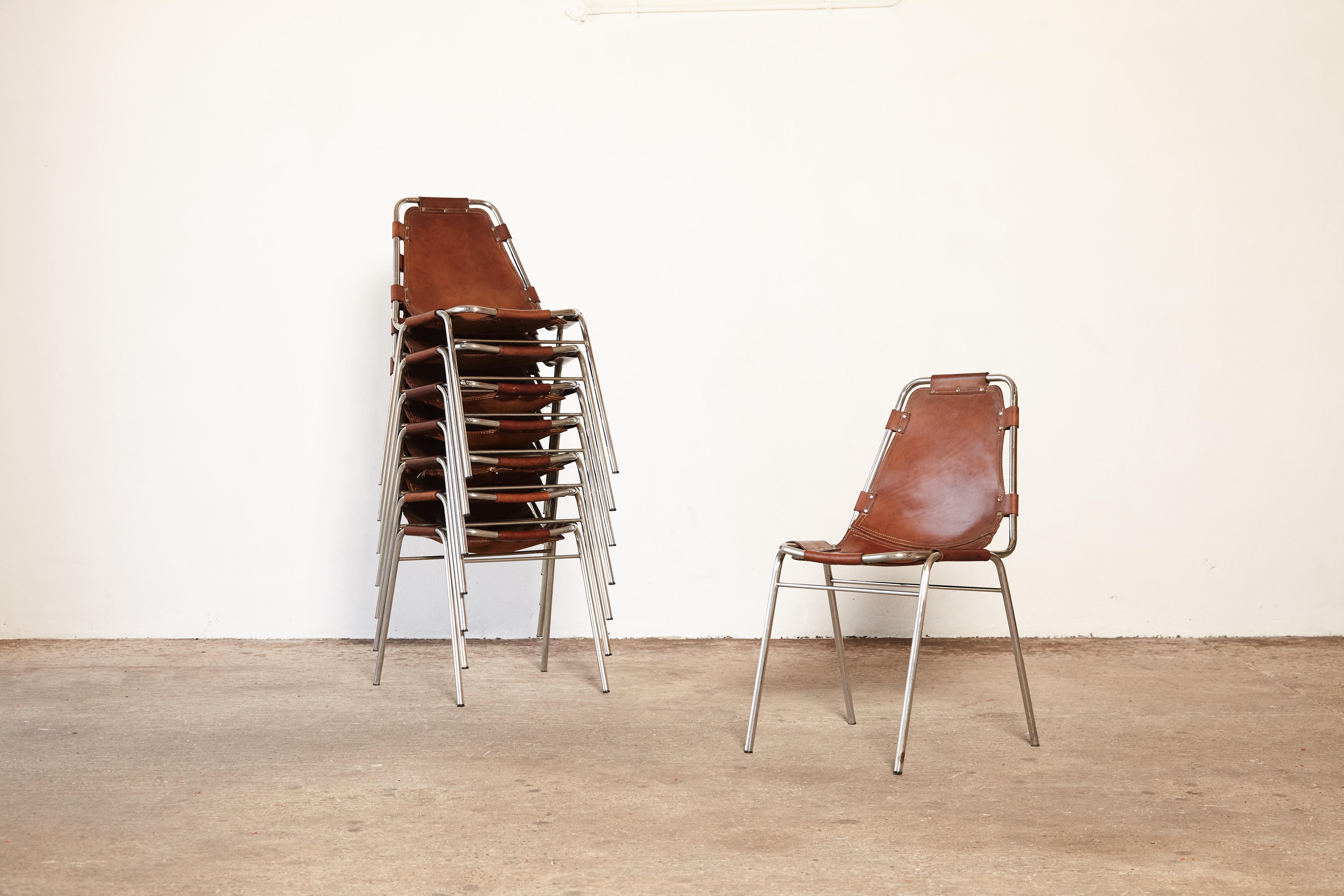 Set of 8 'Les Arcs' chairs in tubular steel and cognac leather, France / Italy, 1970s. Patinated original leather.

Les Arcs was a project on which Charlotte Perriand collaborated with some other architects who developed the interiors as well. 