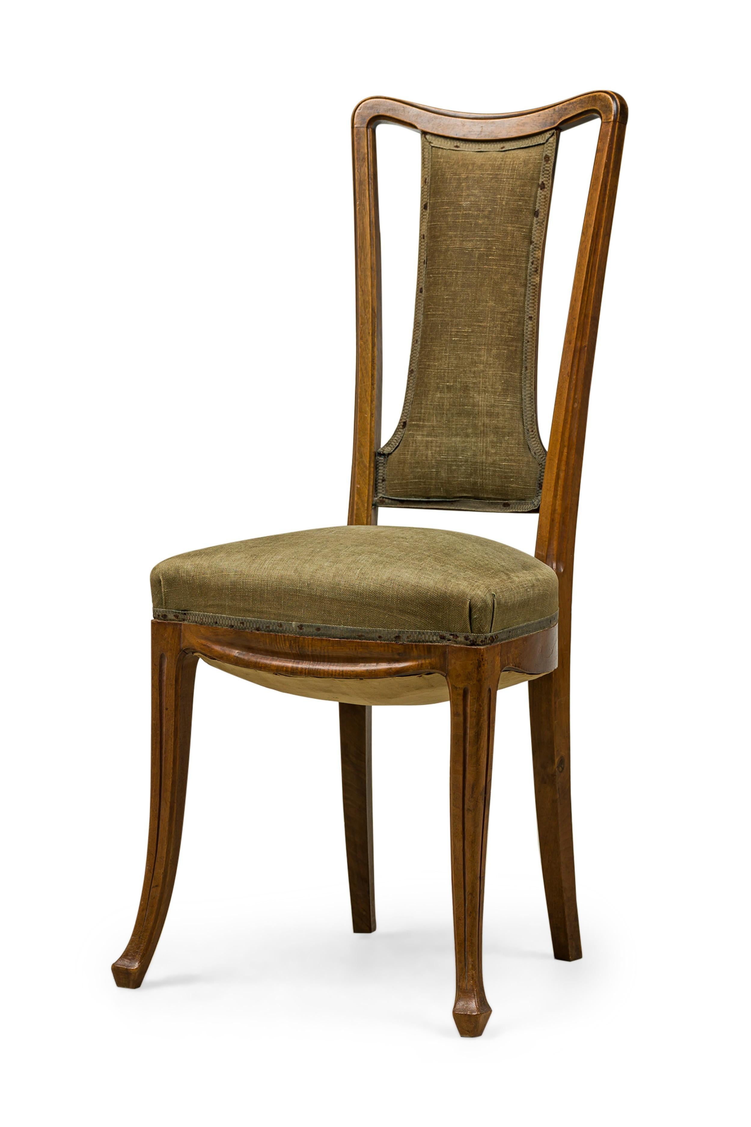 Art Nouveau Set of 8 Louis Majorelle Carved Walnut and Sage Green Muslin Side Chairs For Sale