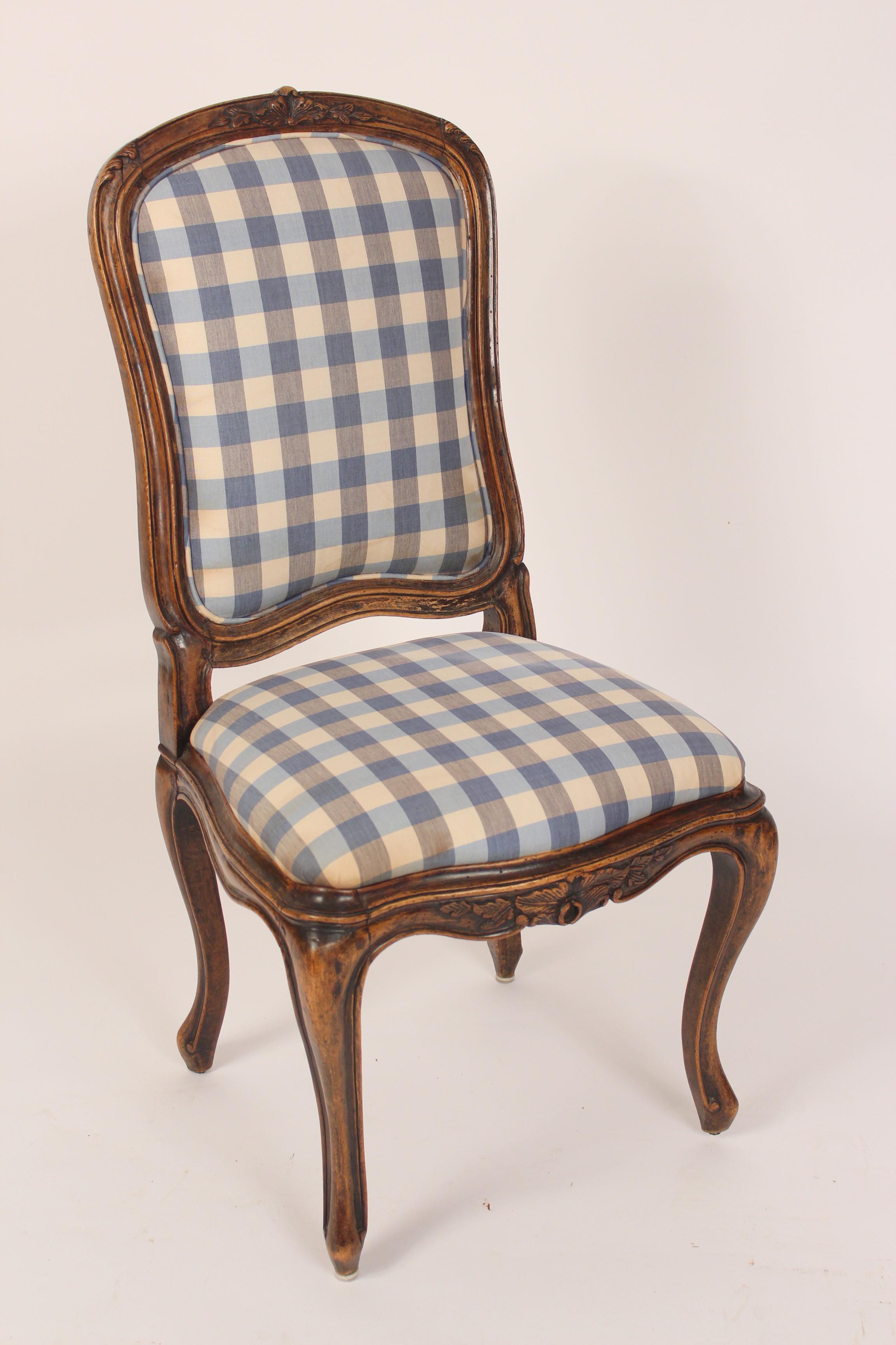 Set of 8 antique Louis XV provincial style beechwood dining room chairs, 19th century. These chairs have an excellent old patina. The chair seat measures 16