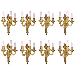 Set of 8 Louis XVI Style Gilt Bronze Three-Arm Wall Sconces