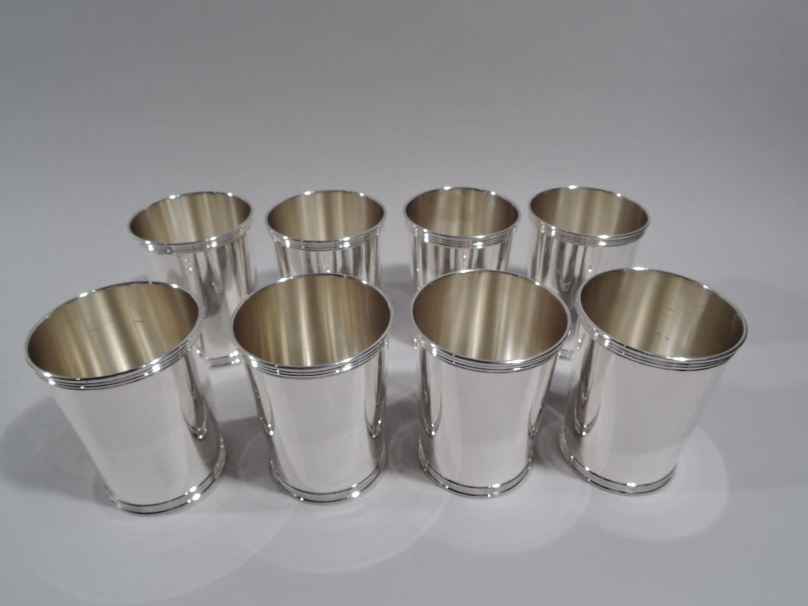 Set of 8 sterling silver mint julep cups. Made by Manchester in Providence. Each straight and tapering sides and reeded rim and foot. Fully marked and numbered 3759. Total weight: 31 troy ounces.