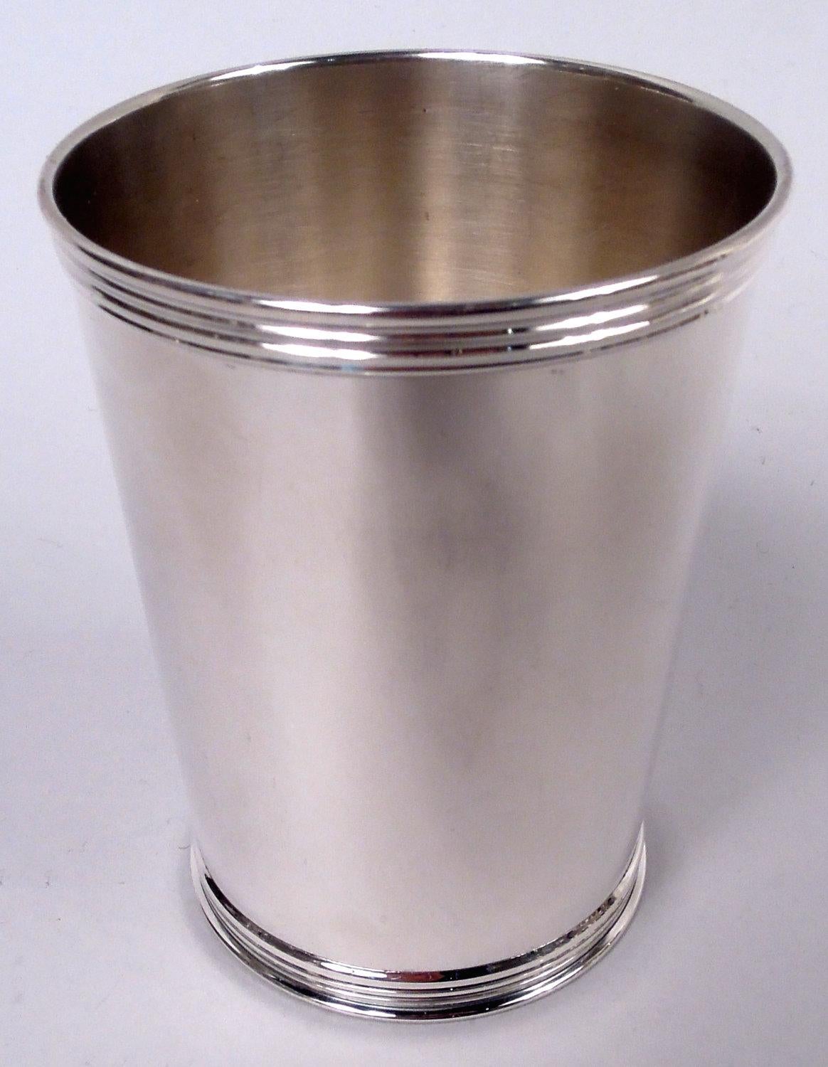 Set of 8 traditional sterling silver mint juleps. Made by Manchester in Providence. Each: Straight and tapering sides and reeded rim and foot. Fully marked including maker’s stamp and no. 3759S. Total weight: 34 troy ounces. 
