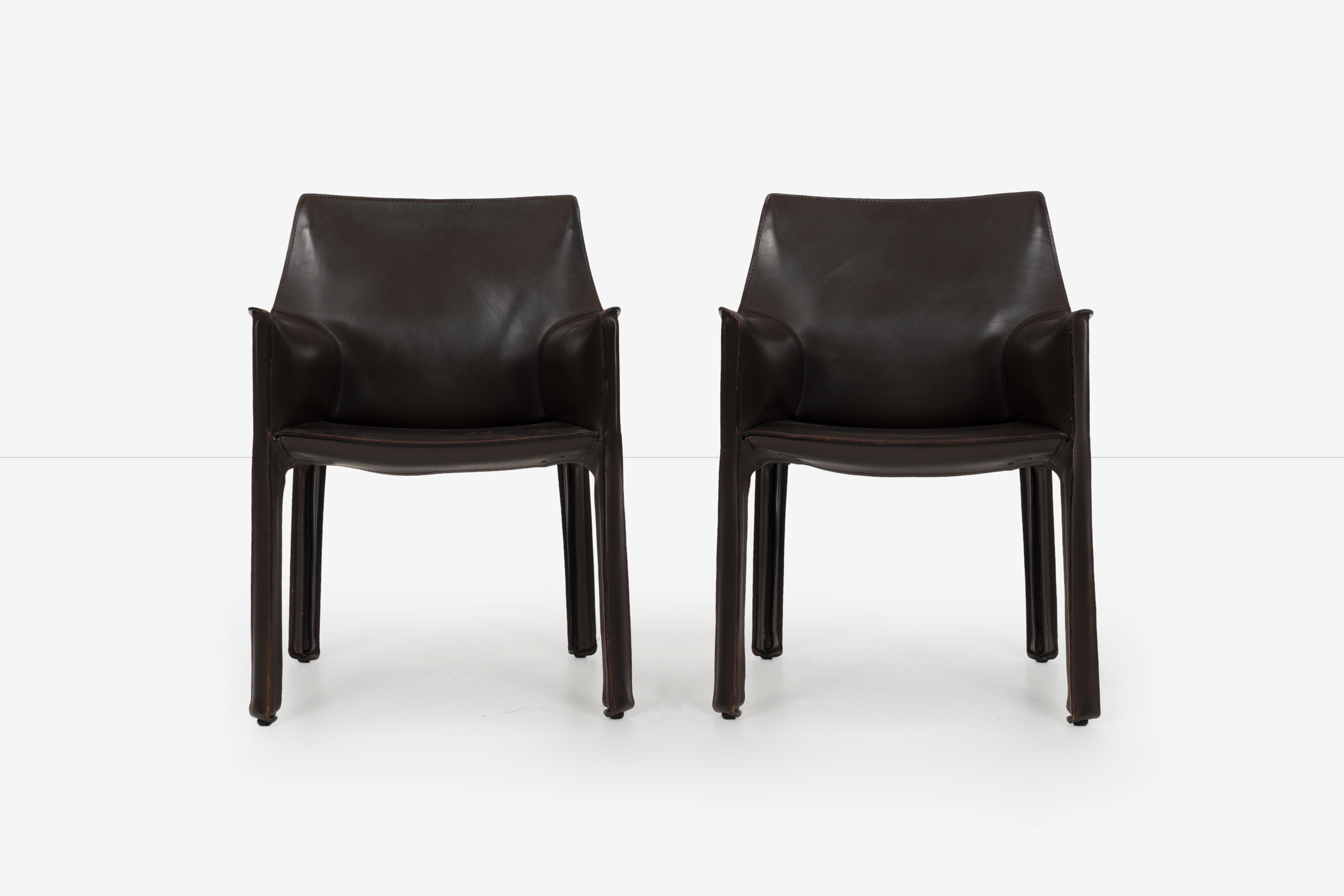 Set of 8 Mario Bellini cab chairs, chocolate brown leather with 6 (model 412) side chairs and 2 (model 413) armchairs.
Cab was the first-ever chair to feature a free-standing leather structure, inspired by how our skin fits over our skeleton. The