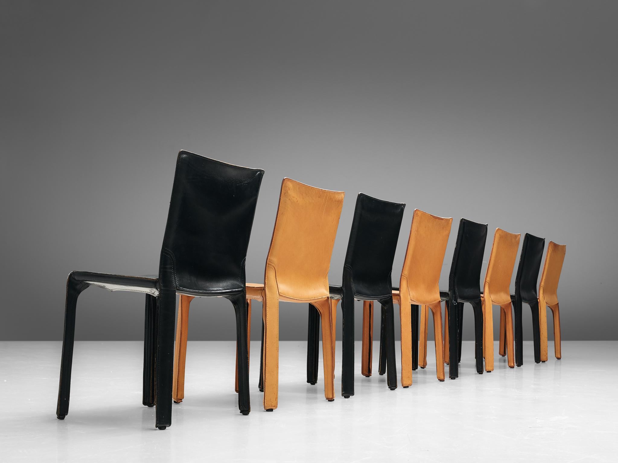 Mario Bellini for Cassina, set of 8 'cab' dining chairs, black and cognac leather, Italy, 1970s.

Conceptually, the chair was designed to become marked and shaped over time by its user. The leather skin fits like a glove over the steel skeleton and