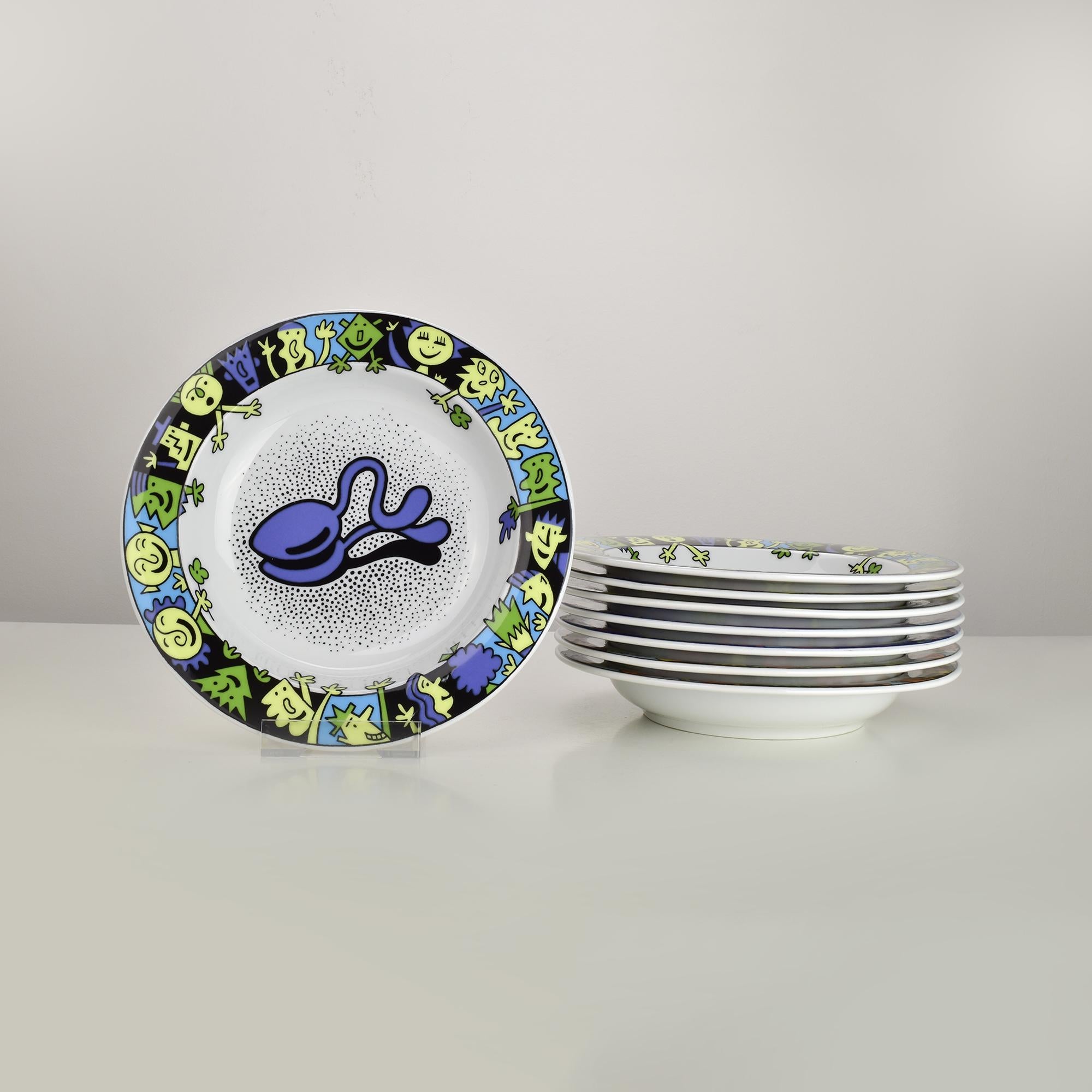 Vibrant and full of character, this set of eight porcelain pasta and soup plates by Bopla Langenthal captures the playful spirit of the Memphis design movement of the 1980s. Each plate features a deep form ideal for pasta, soups, risotto, or stews,