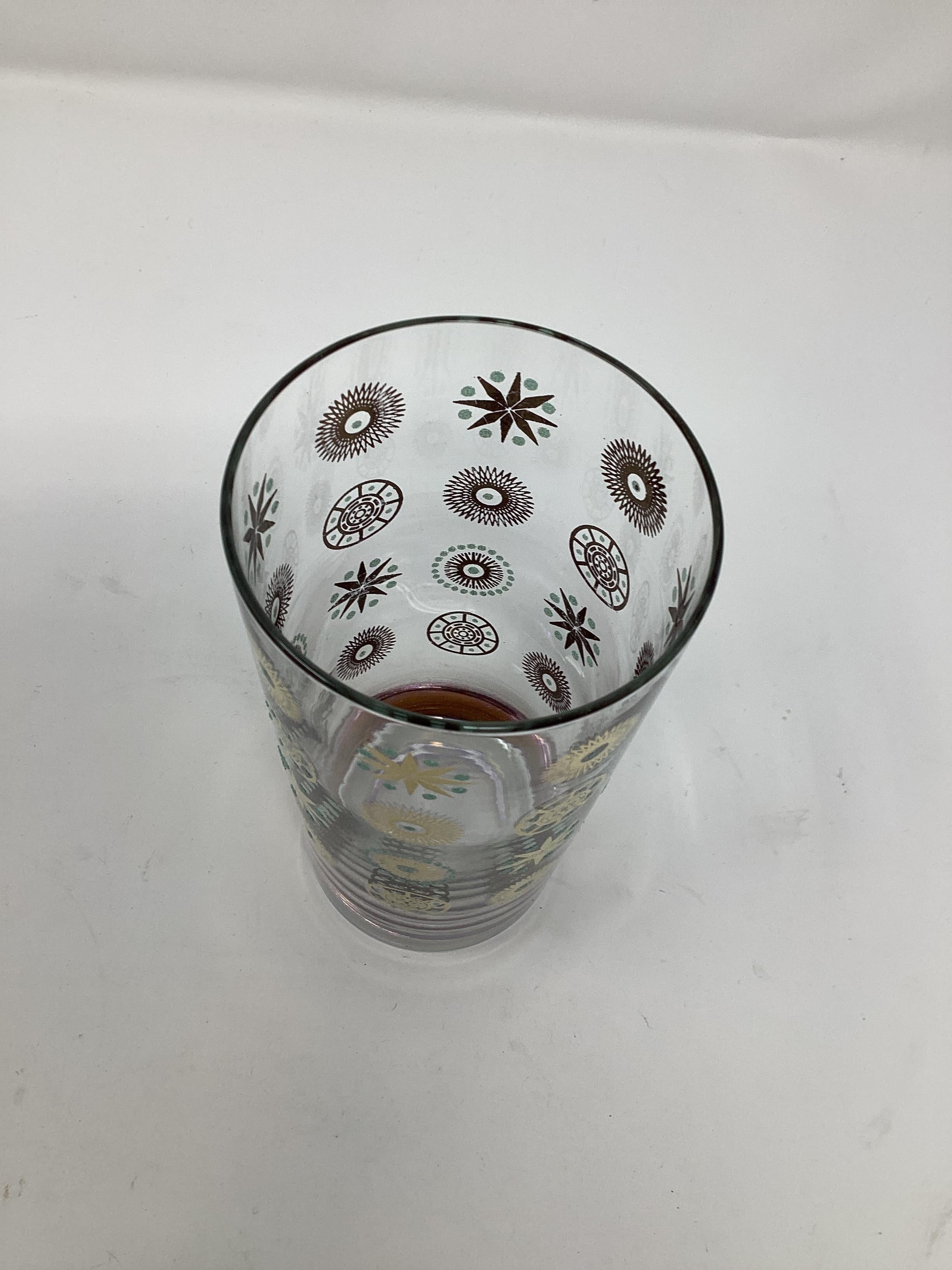 Set of Eight Mid Century Atomic Highball Glasses. Decorated in 22k gold with a starburst design