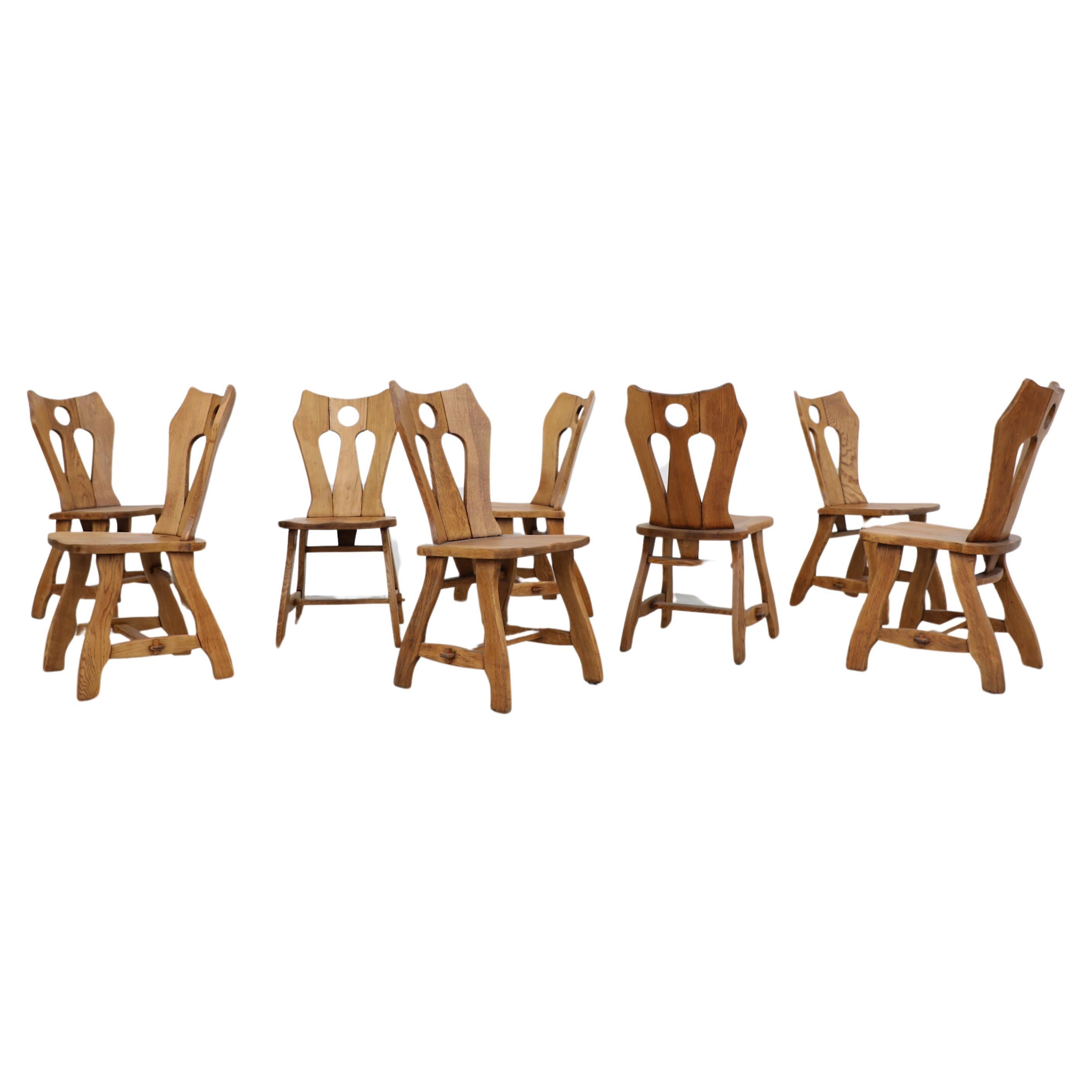 Set of 8 Mid-Century De Puydt Ornate Brutalist Oak Chairs For Sale